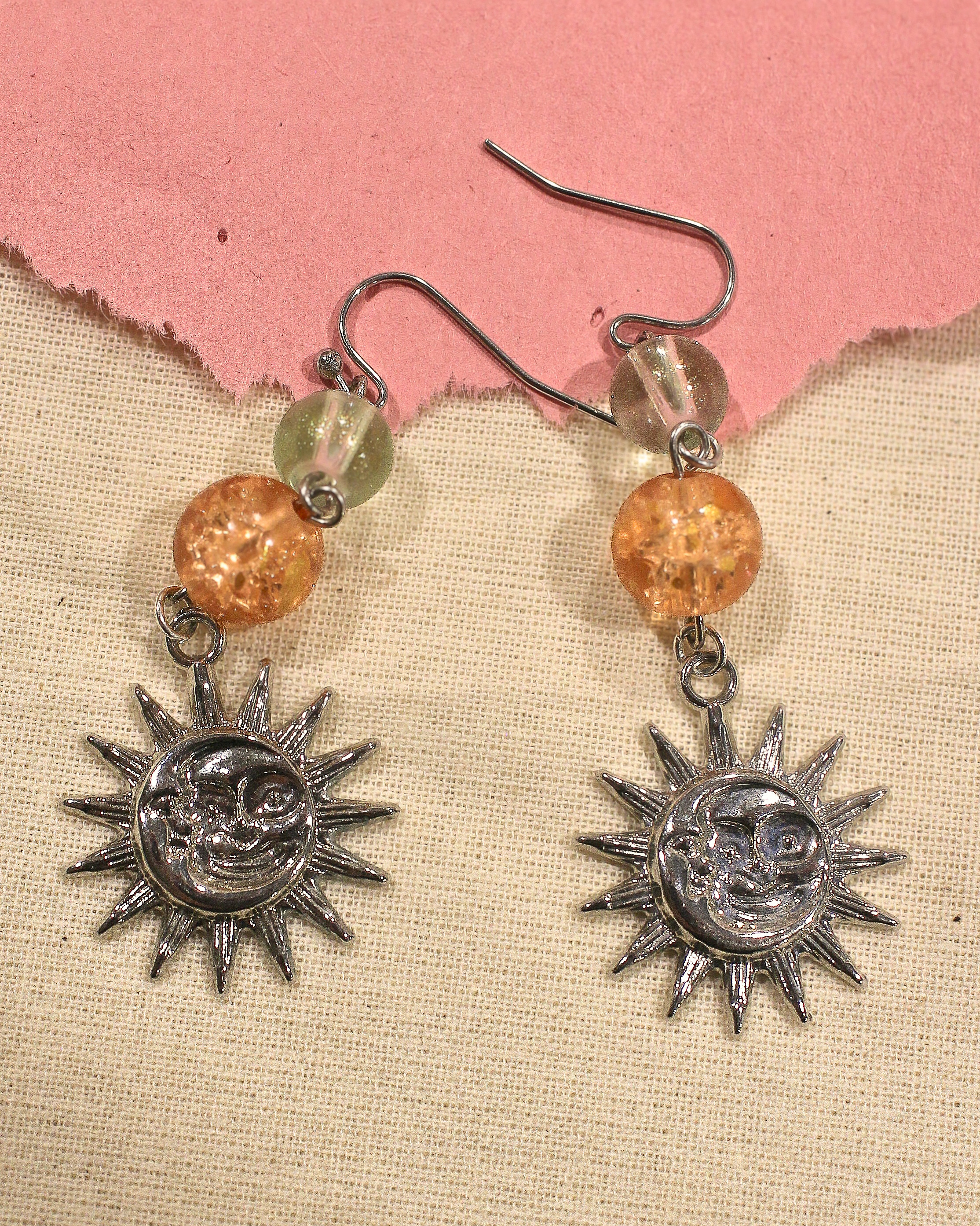 Green and Orange Sun earrings.png