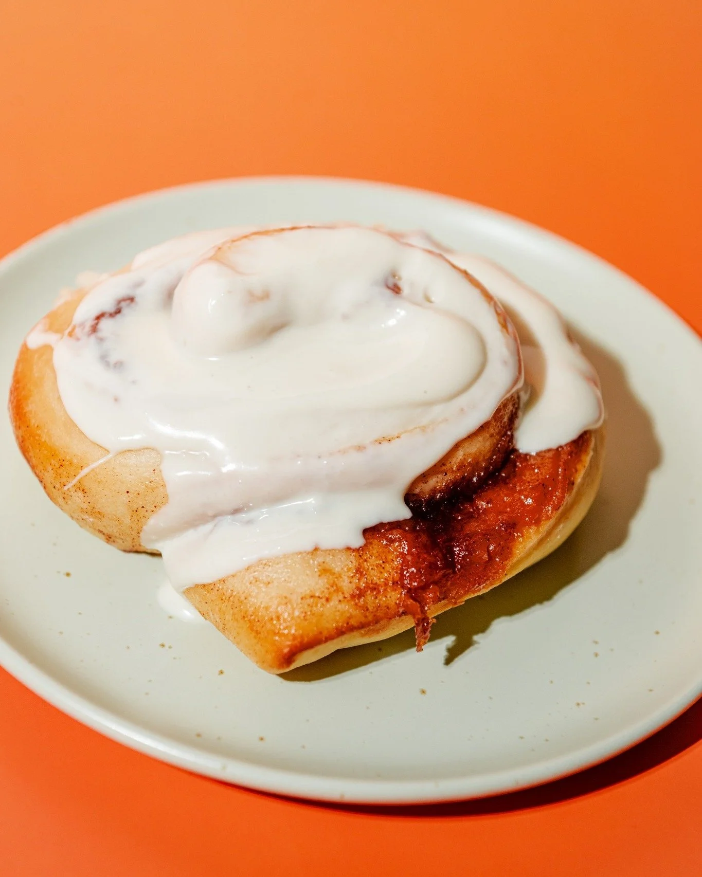 cinnamon buns are cute. ours went to finishing school. same cozy swirl, plus apple butter and a white-chocolate finish. richer. warmer. very hard to share.