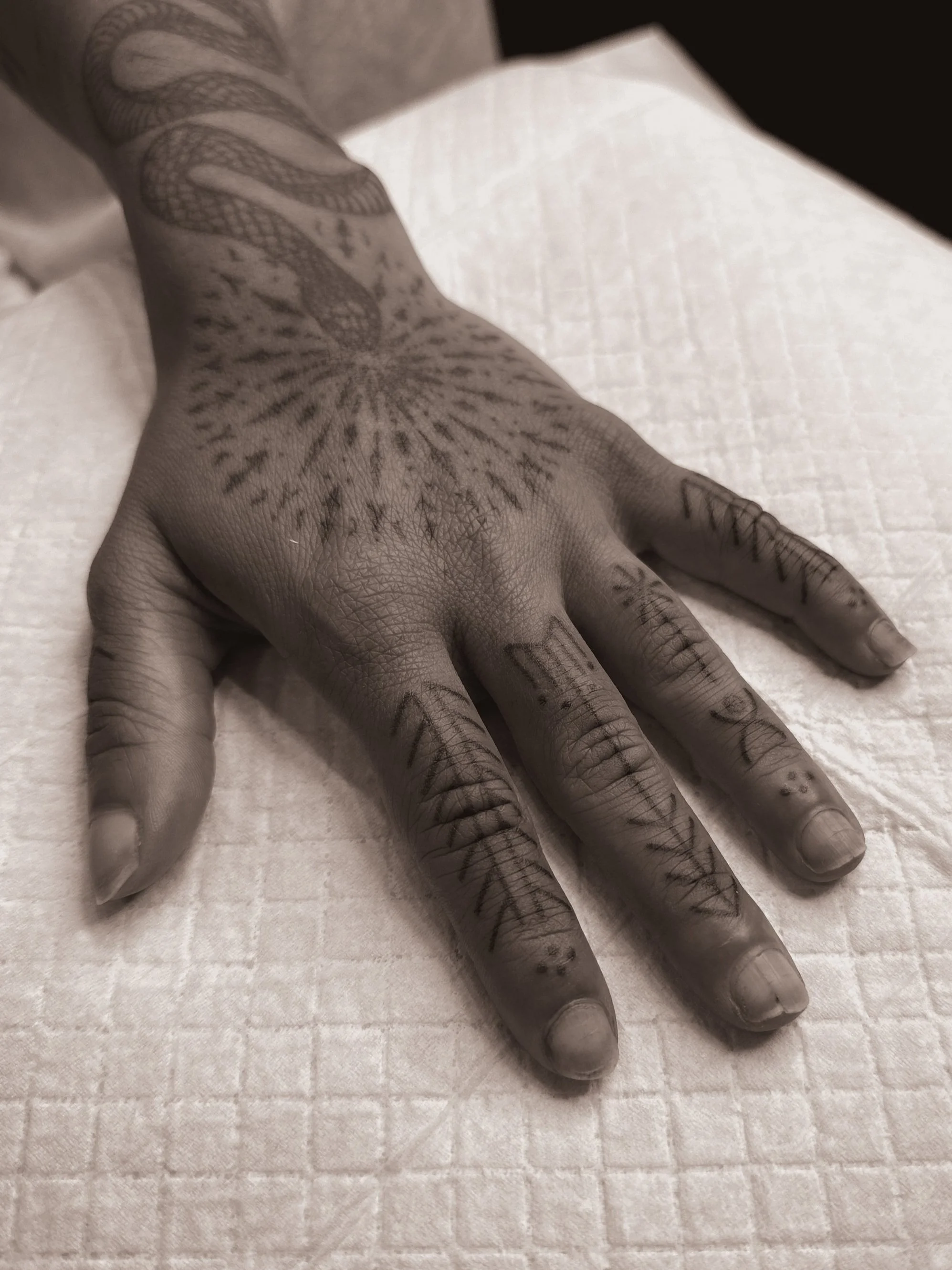 jurrah clarita handpoked tattoos custom batek inspired finger markings sydney