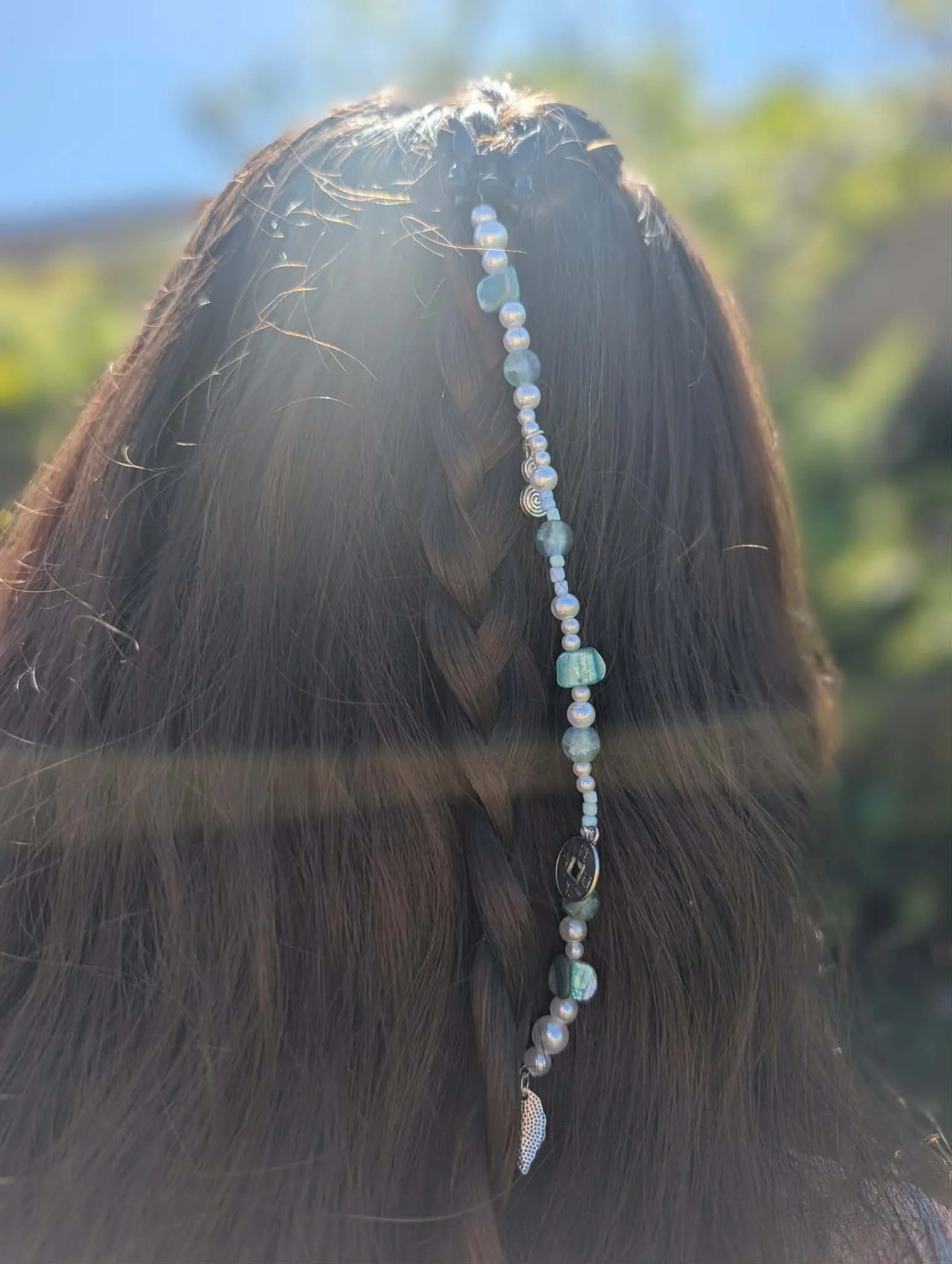 blue bead in hair.jpg