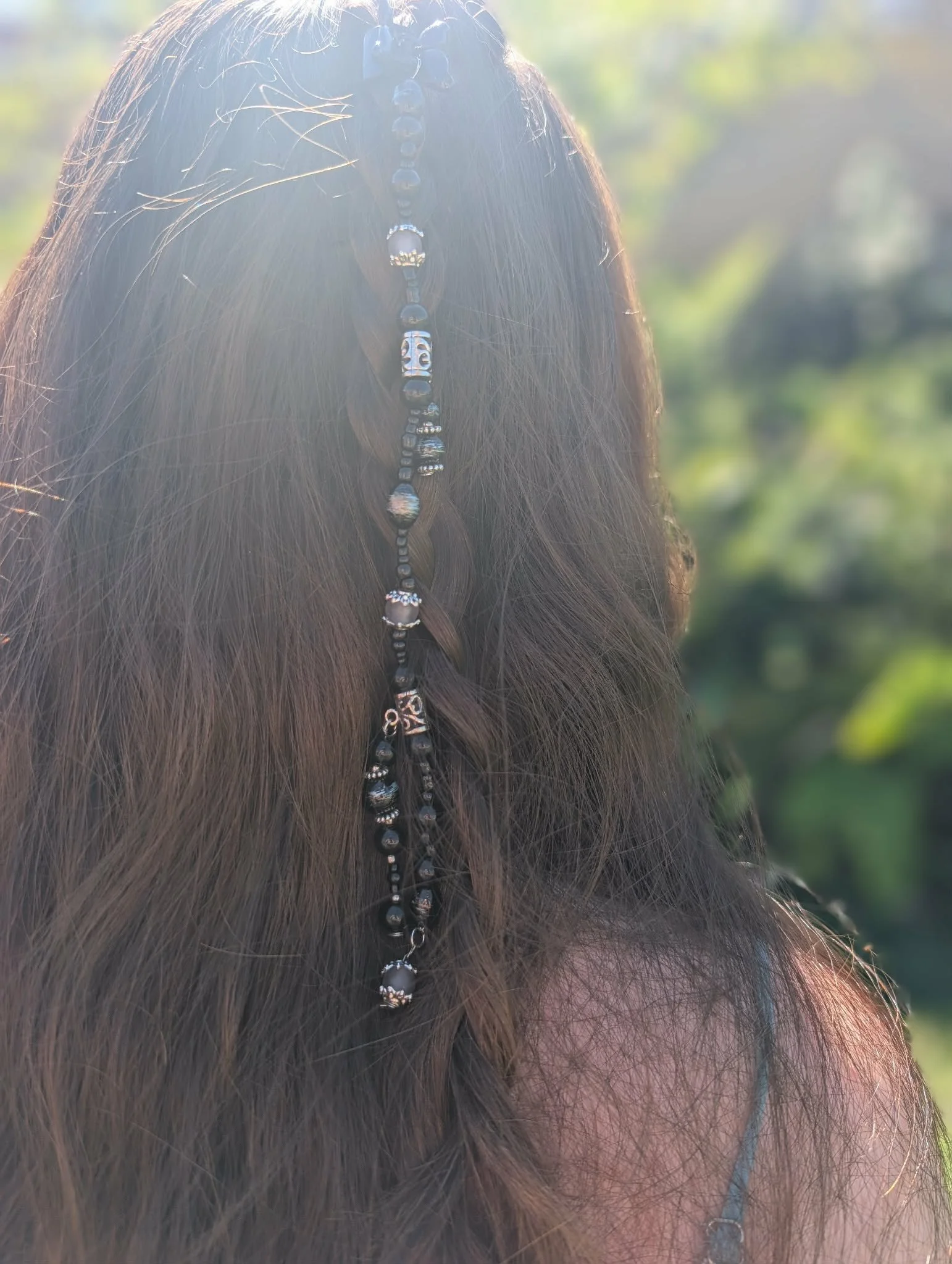 black beads in hair.jpg