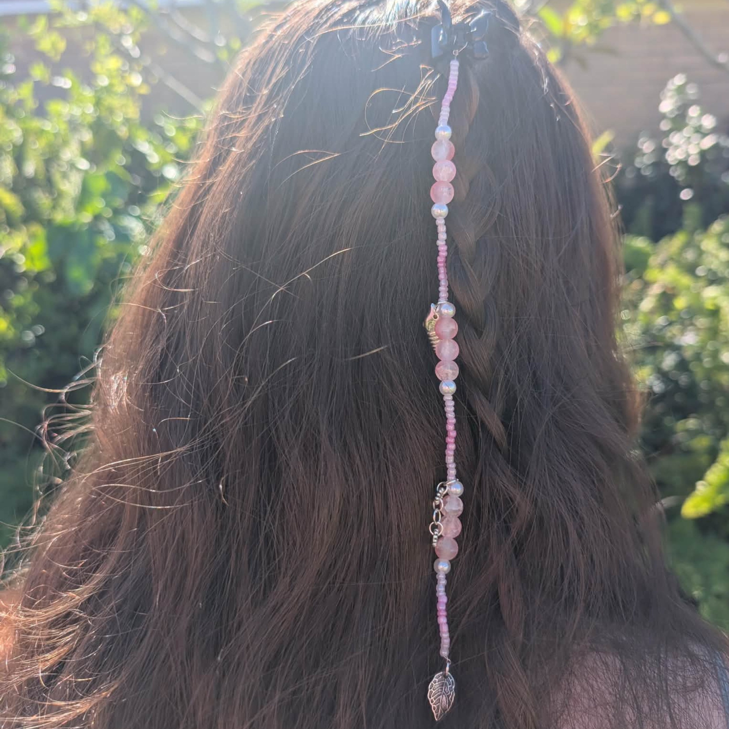 pink bead in hair.png