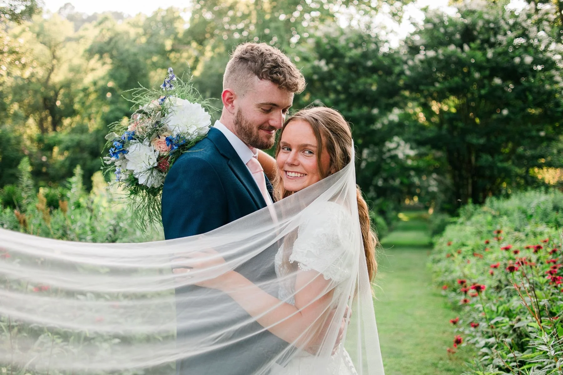 bride groom in garden at liberty hall historic site in frankfort ky