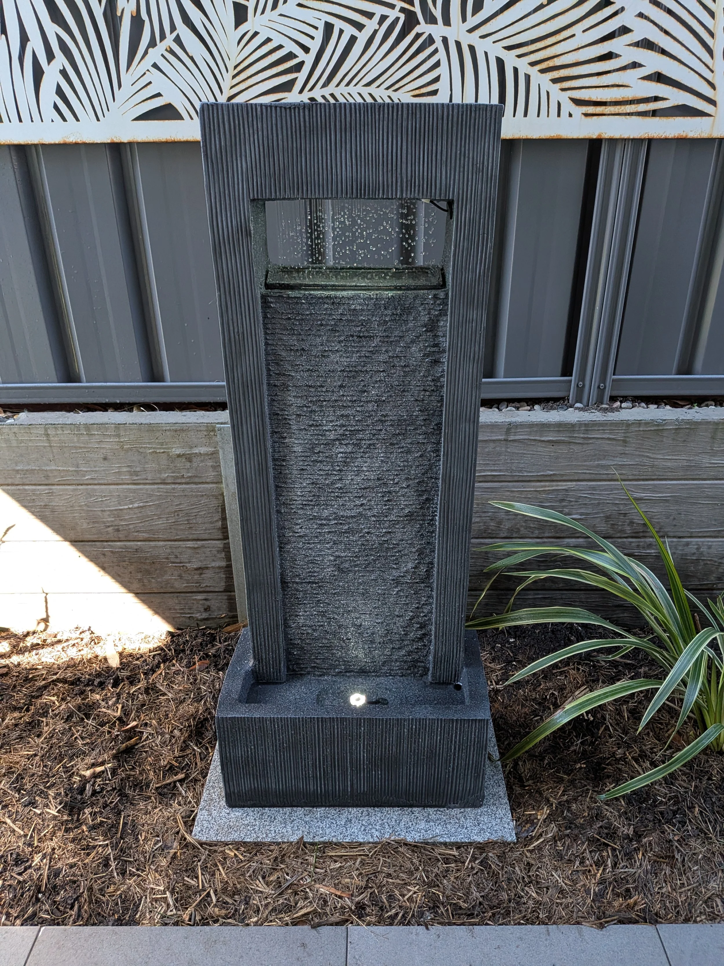 Water feature in backyard garden