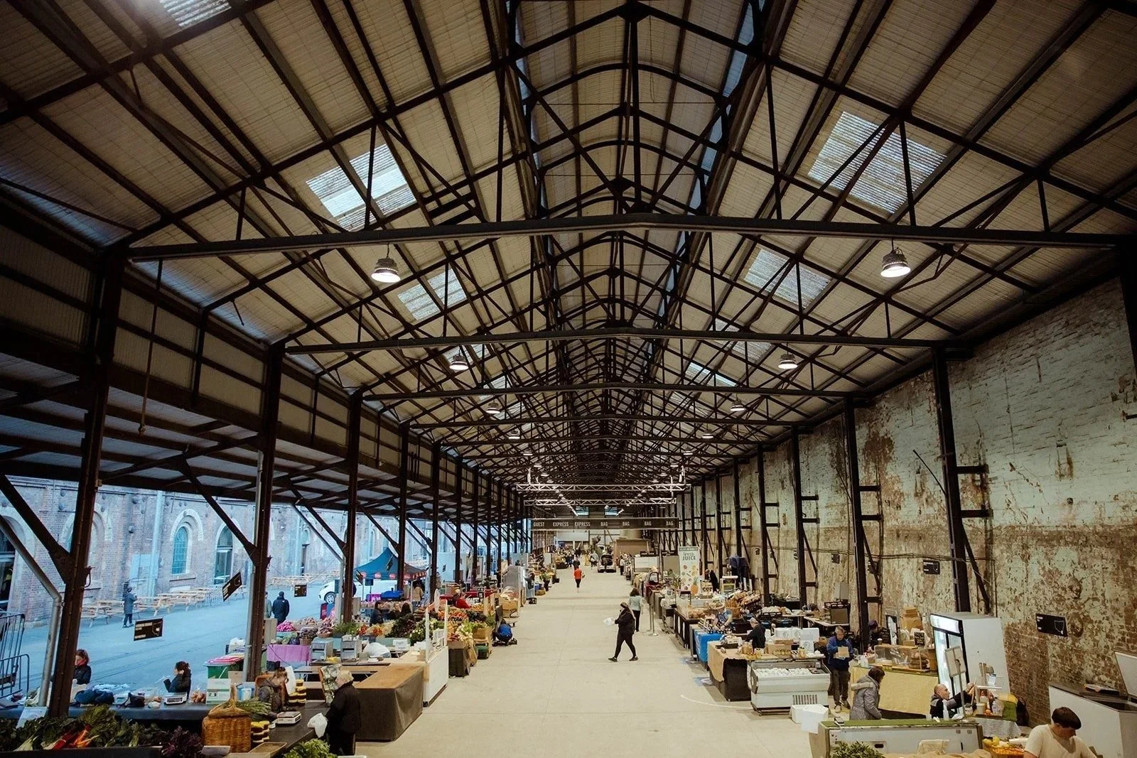The long iron-roofed hall at Carriageworks set up for the Winter Seasonal Market