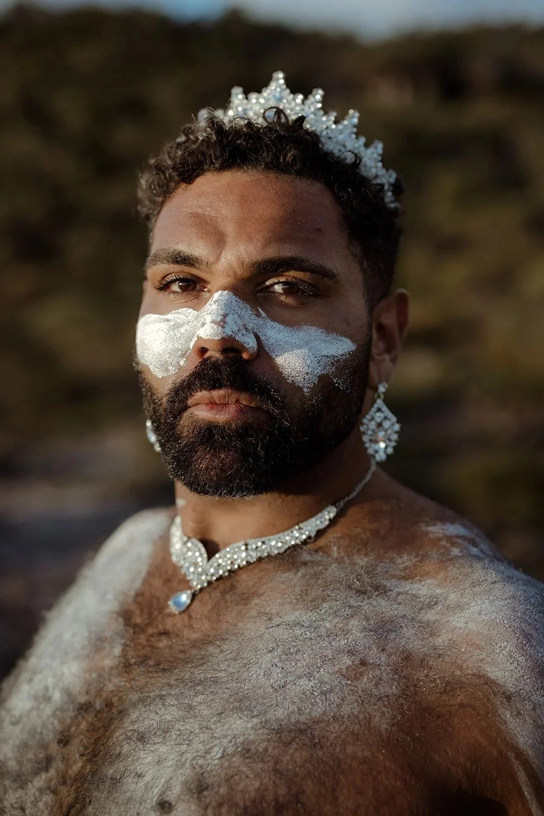 Dylan “Shaede” Hoskins in white ochre and a crown