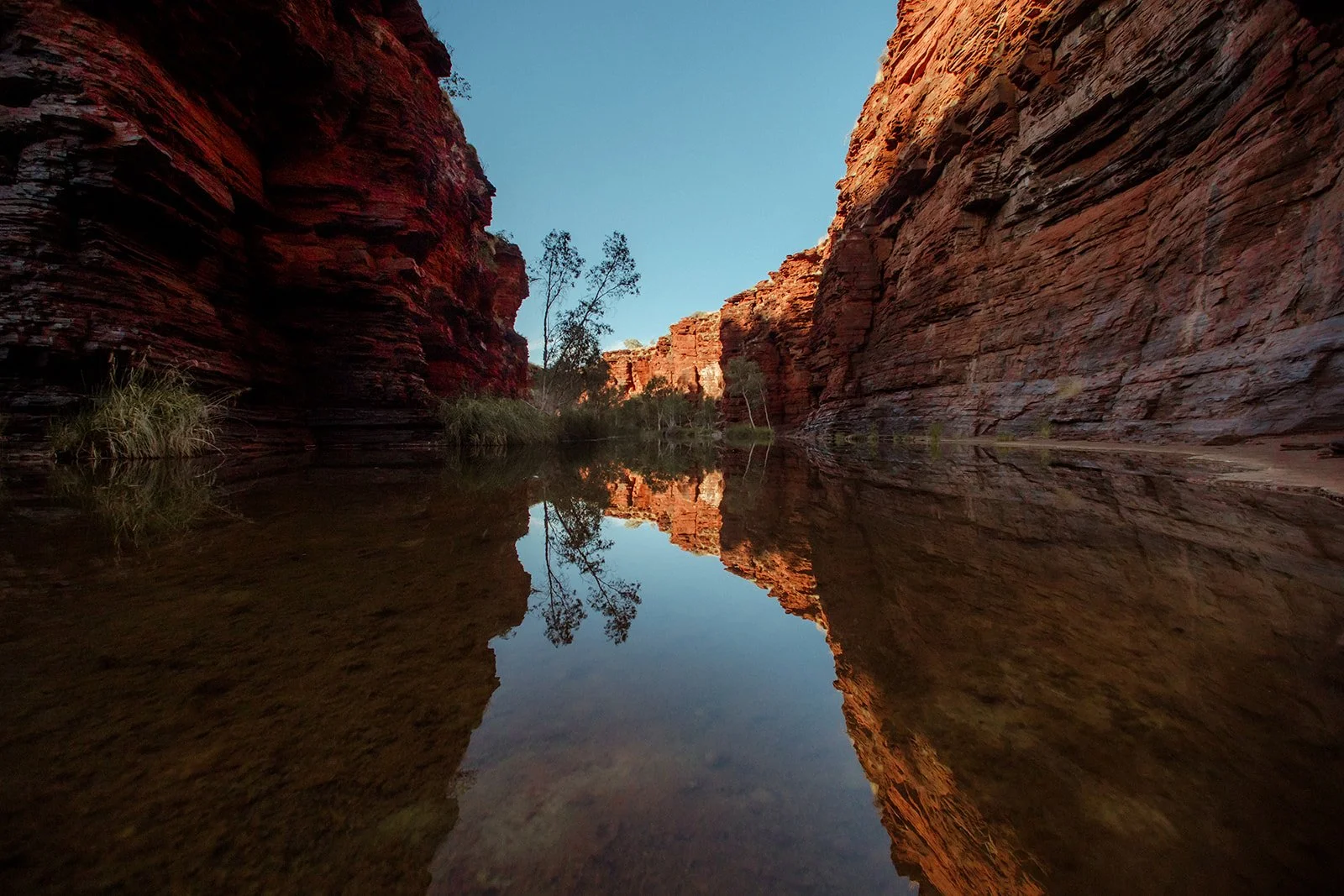 Gorge walls reflected in still water, Karijini National Park