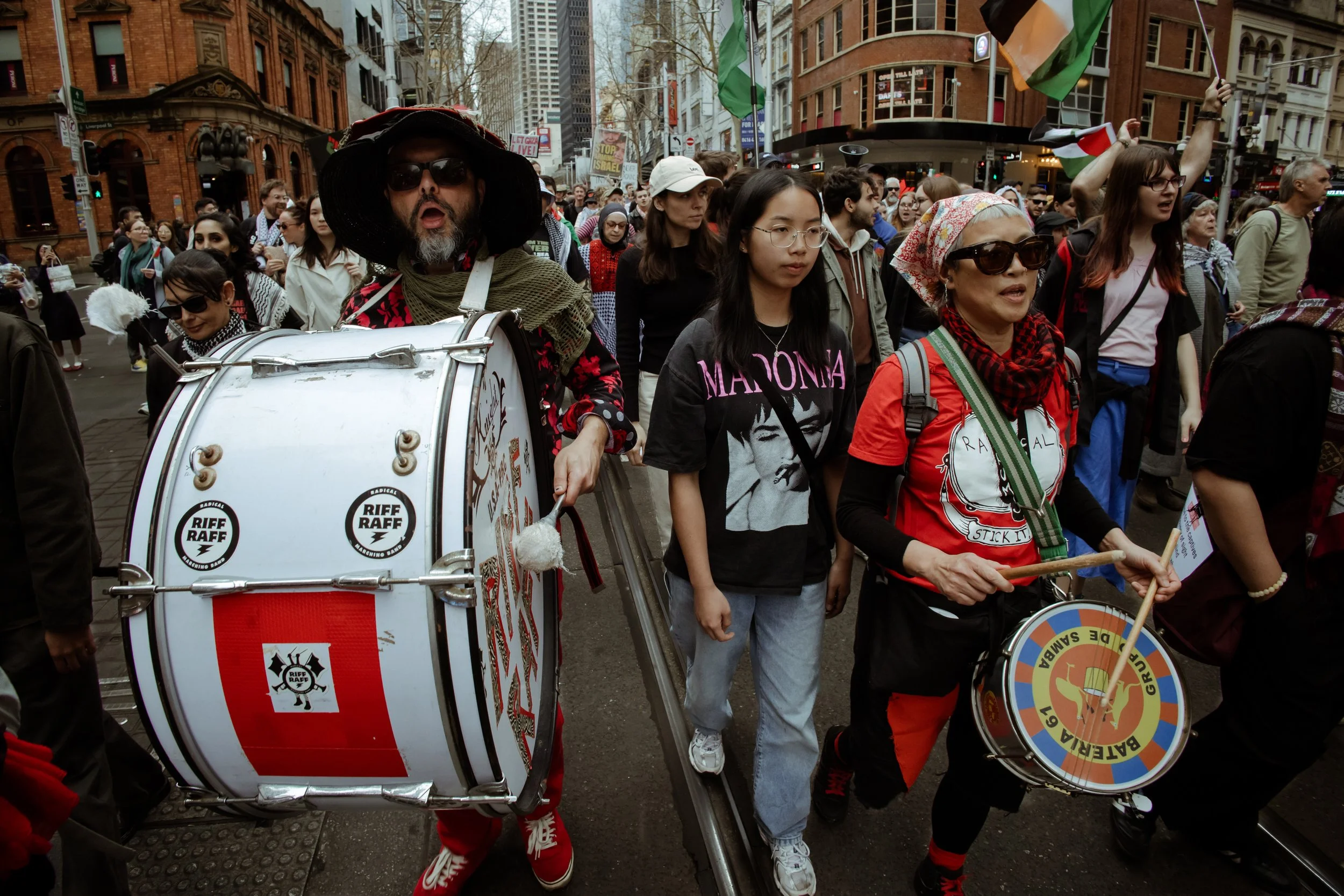 Drummers leading the march with a red drum