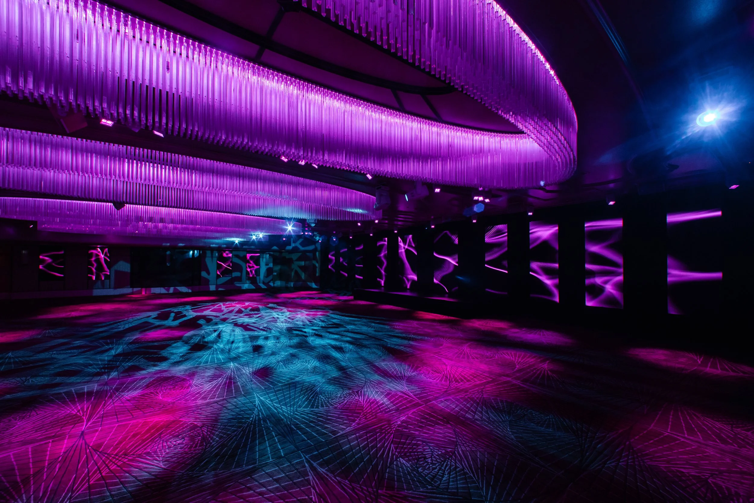 The Grand Ballroom at Shangri-La Hotel, Sydney in purple light, set for an event