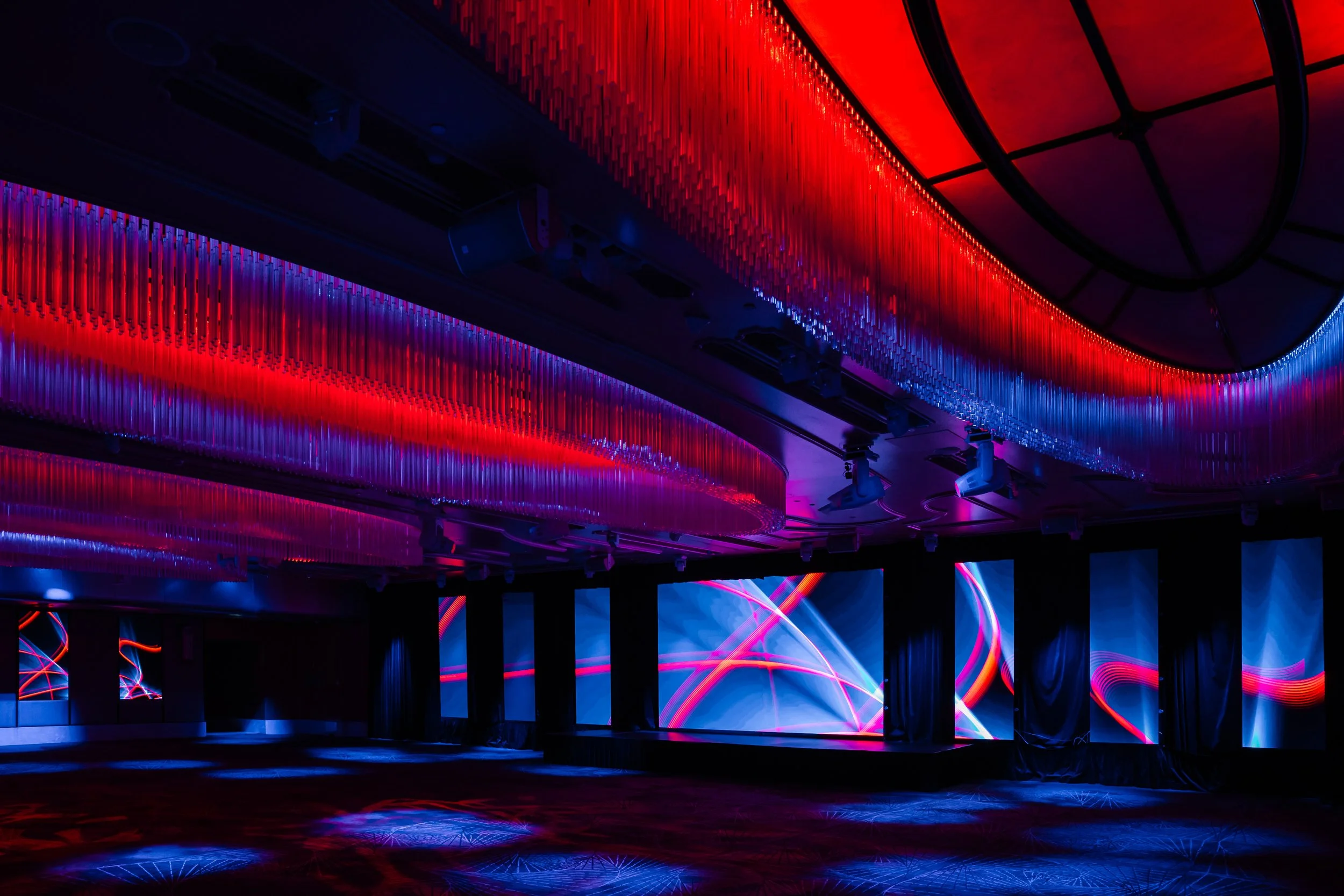 The Grand Ballroom at Shangri-La Hotel, Sydney with red stage and effects lighting
