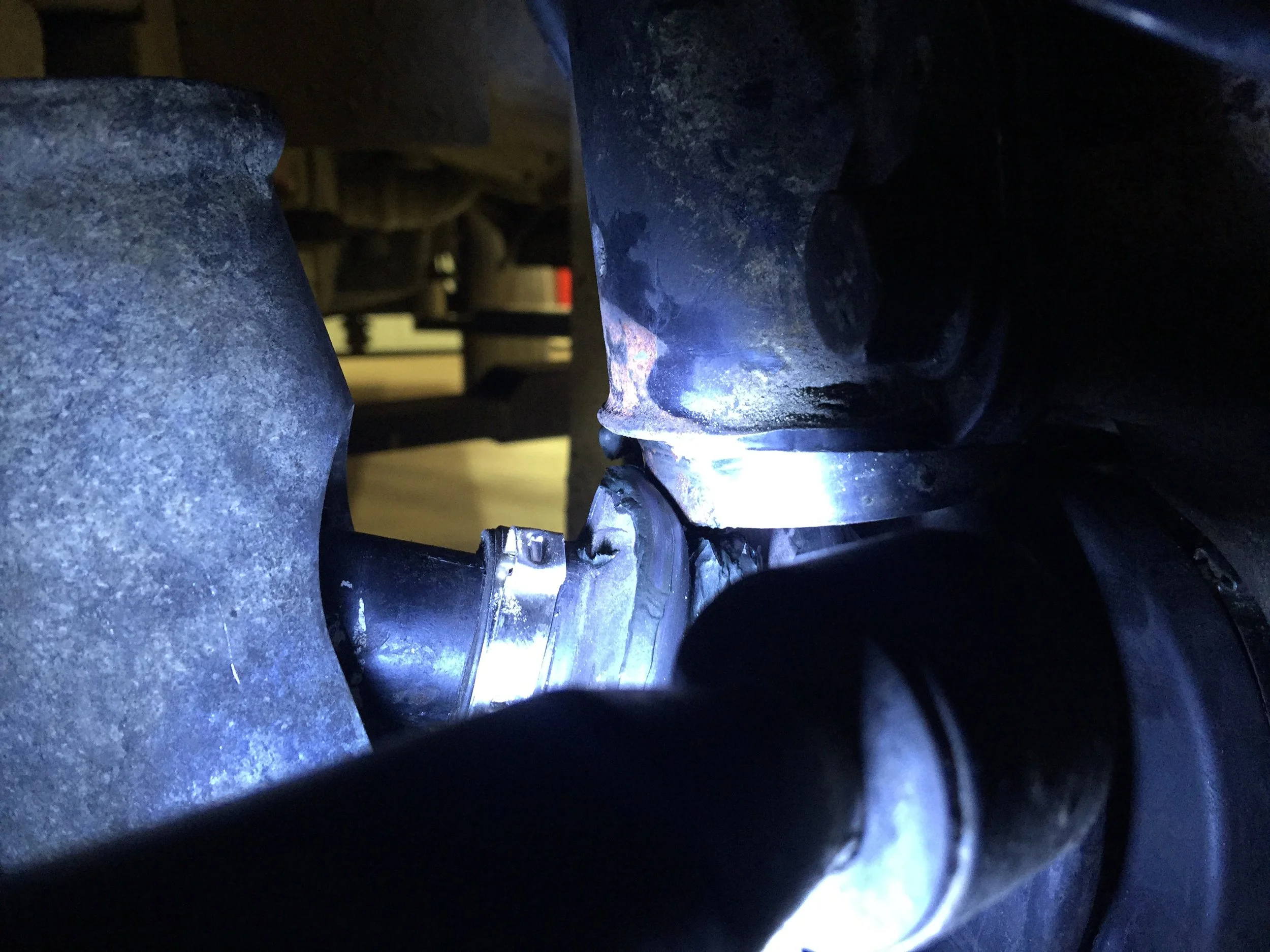 Close-up of of shock absorbers that destroyed the driveshaft sleeves.