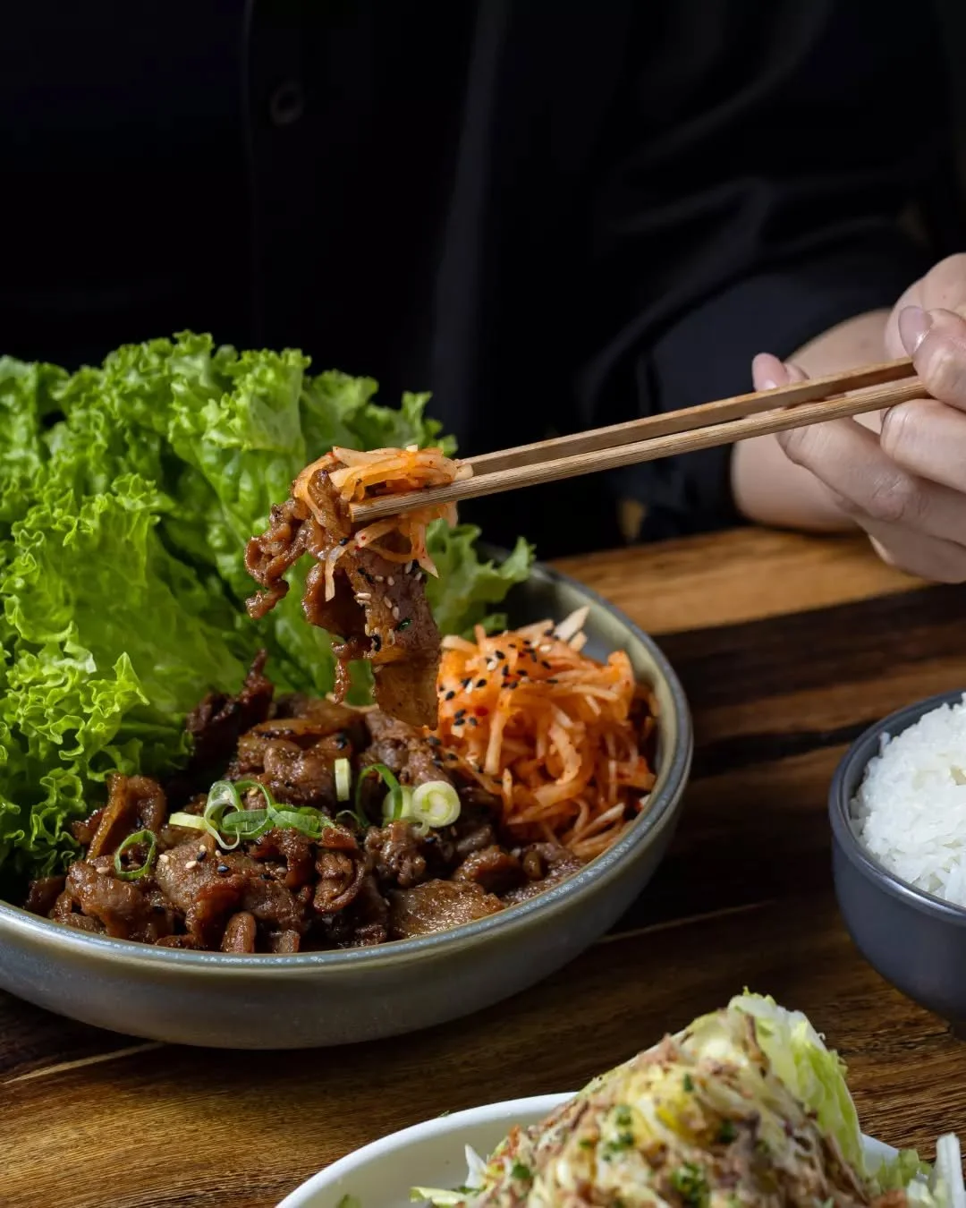 Our new dish brings a true Korean classic to the table ✨ Wrap tender soy marinated pork in fresh lettuce with seasoned radish for a classic ssam bite. Fresh, bold and full of Seoul Night flavour.