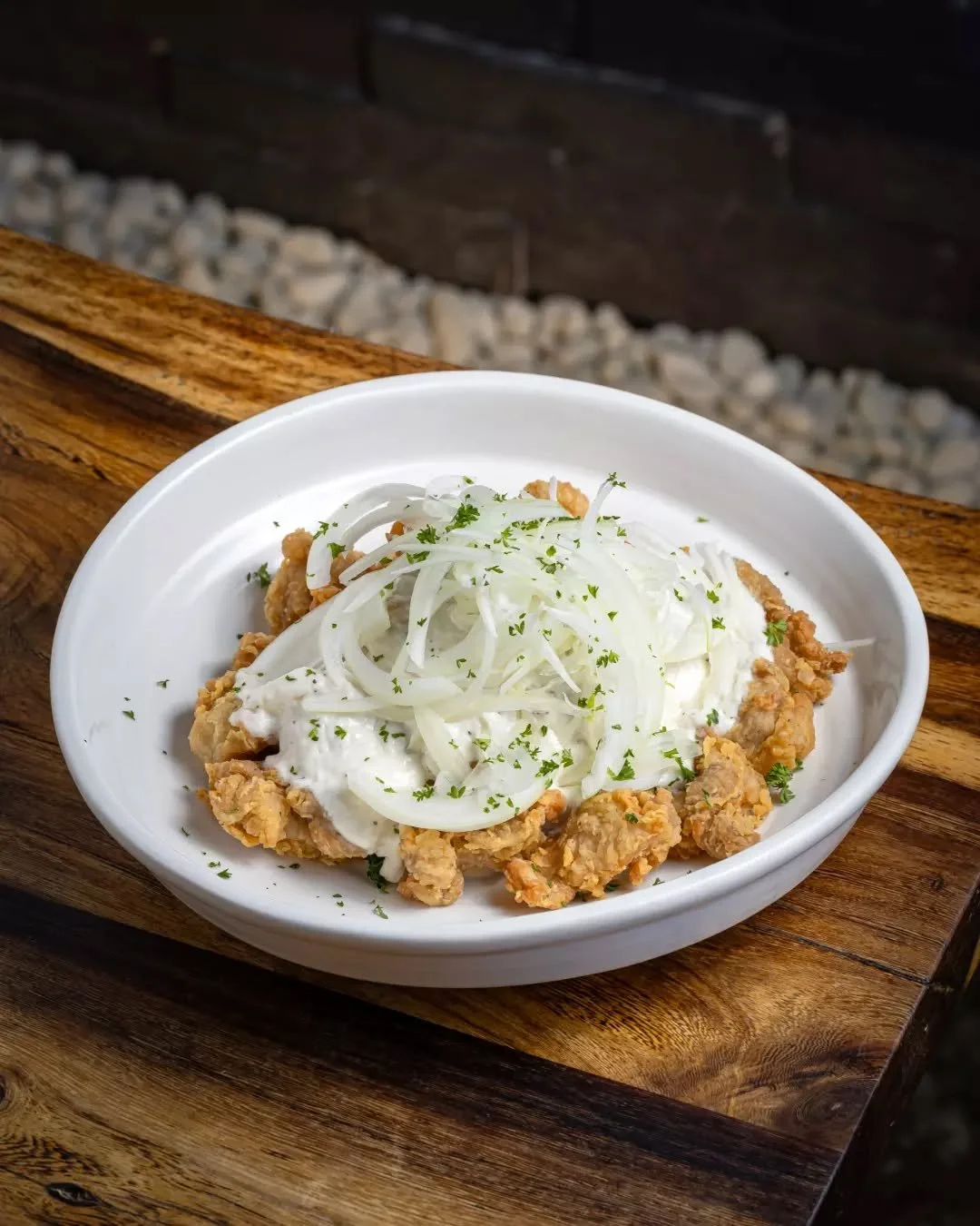 Crispy on the outside, creamy where it counts. Our Creamy Onion Chicken is a must. 🍗🍽️