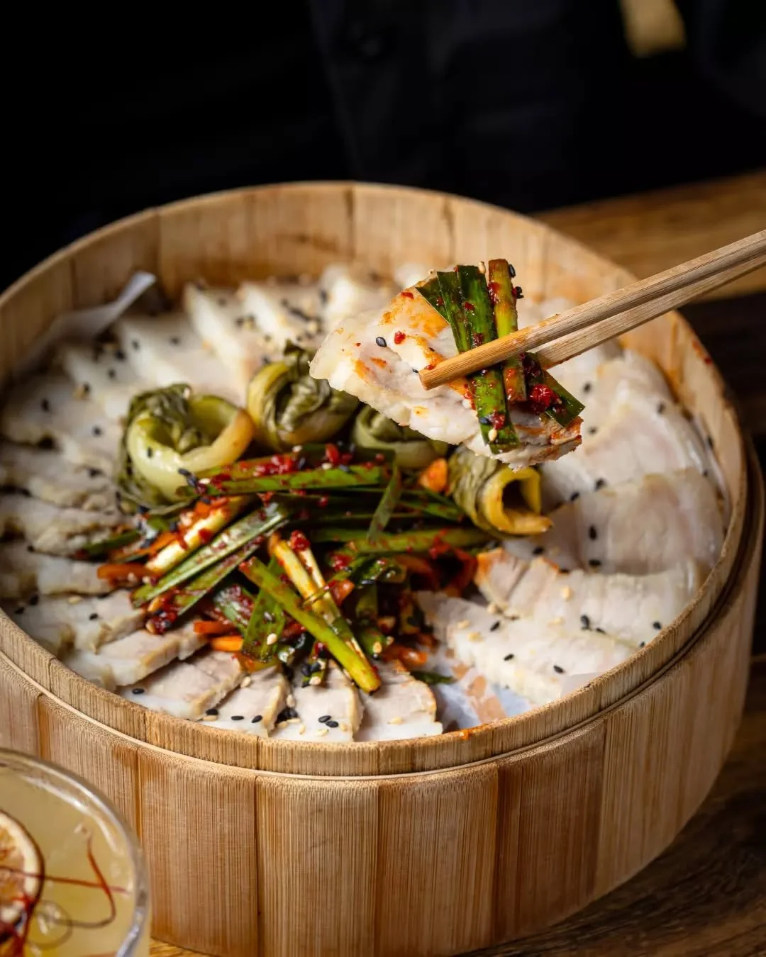 Bossam is a classic Korean dish of slow-cooked pork belly, traditionally wrapped in fresh greens and paired with bold, savoury sides. Comforting, rich, and made for sharing. Try it the Seoul way 🥢😮&zwj;💨