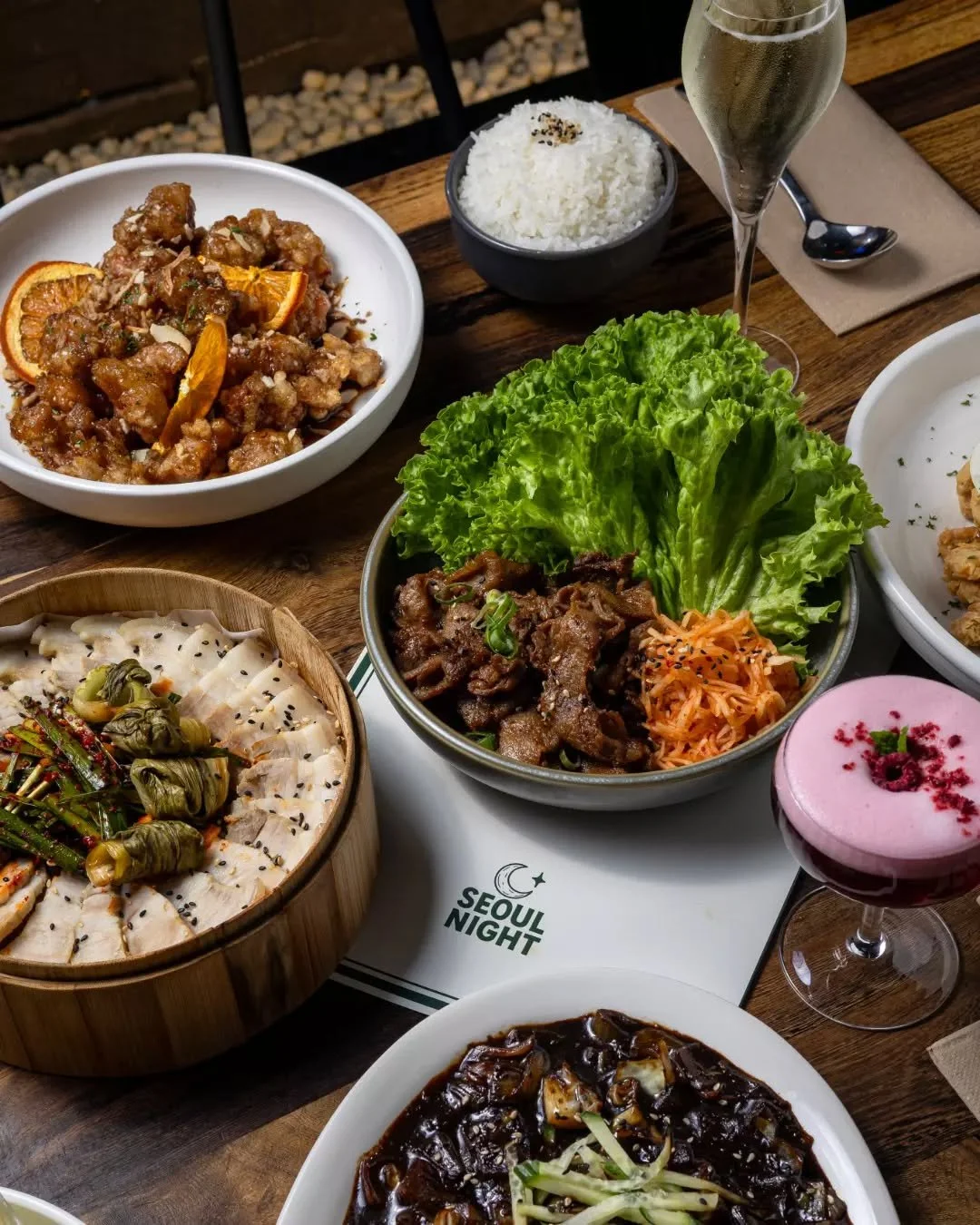 Forget the clich&eacute;s. We&rsquo;re doing Valentine&rsquo;s under the neon. 🌌 Escape the ordinary and dive into a Seoul nightscape for your dinner plans. High-energy, low-light, and a table waiting just for you. Whether it&rsquo;s a first date or