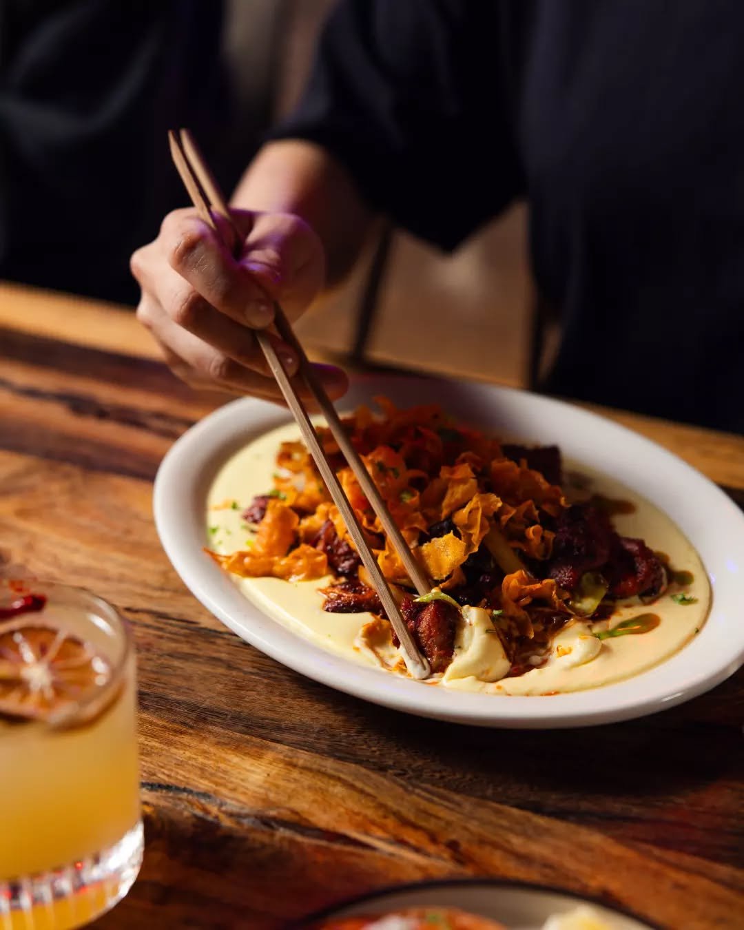If you know, you know 🌶️🔥 Our iconic spicy chicken is making its comeback at Seoul Night in a whole new form. Pan fried Korean spicy chicken layered with rich cheese sauce and topped with crispy kumara crisps for the perfect mix of heat, crunch, an