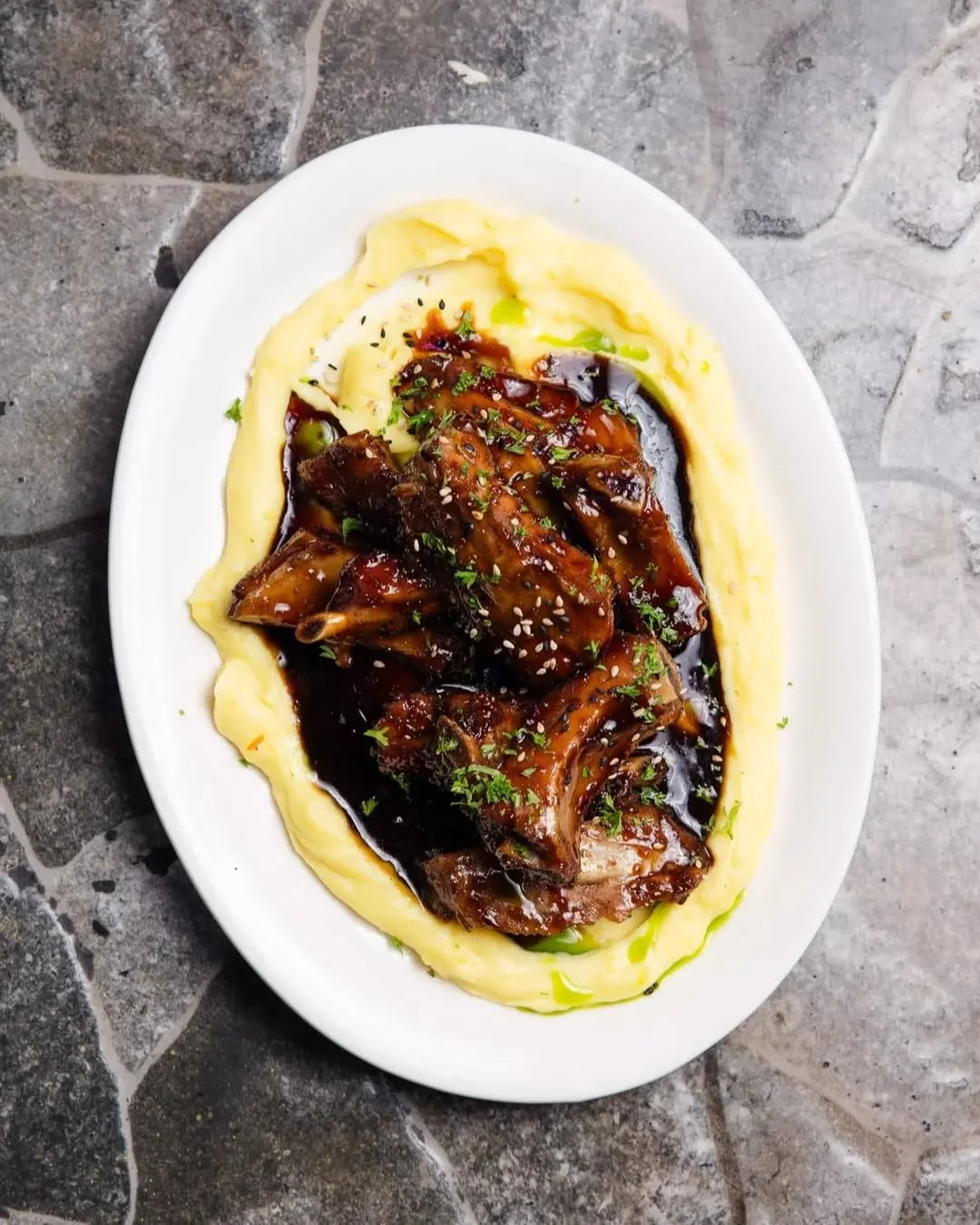 Your next Seoul Night obsession has arrived 🍖🌙 Our new Pork Rib brings tender baby back ribs glazed in a bold soy based sauce, paired with creamy mash potato made for soaking up every last bite.