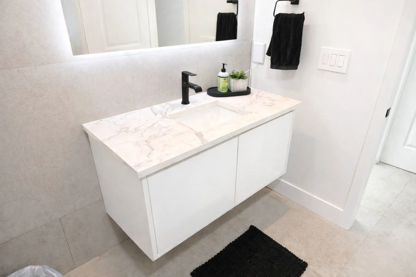 Floating vanities combine clean design with practical planning. Proper wall reinforcement, precise mounting height and clean plumbing coordination are key to achieving a finished look that feels intentional and performs long term.
 #FloatingVanity #B