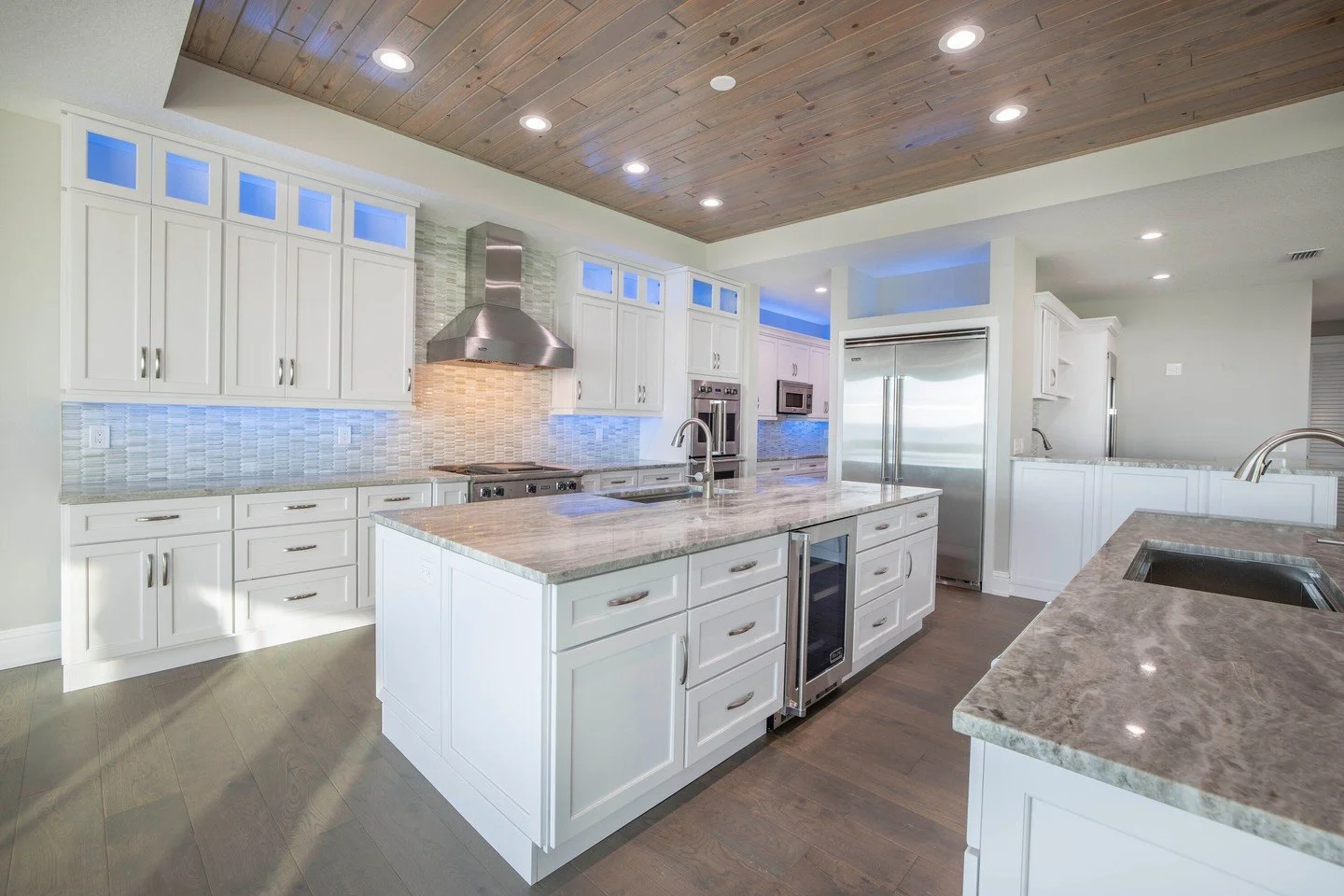 Cabinet lighting works best when it is planned as part of the cabinetry layout and not added afterward.

Under cabinet lighting helps define the workspace by evenly illuminating the countertop while bringing out the texture and movement of the backsp