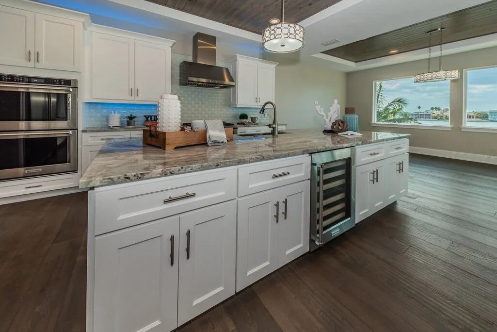 This island is a great example of how full depth cabinets on both sides can make the center of a kitchen work much harder.

That added depth creates more usable prep space, more meaningful storage, and enough room to incorporate beverage refrigeratio