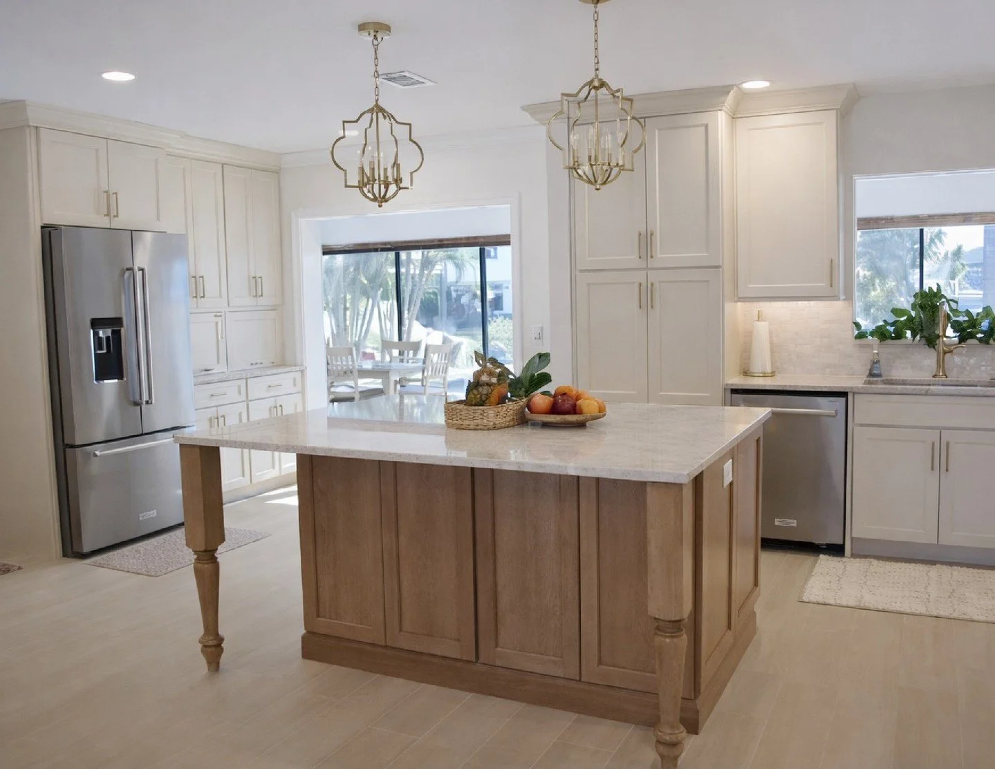 This project started with a layout that limited both storage and flow.

The refrigerator was relocated to a new wall, opening up the primary run of cabinetry and improving overall circulation through the kitchen. This allowed the space to function mo