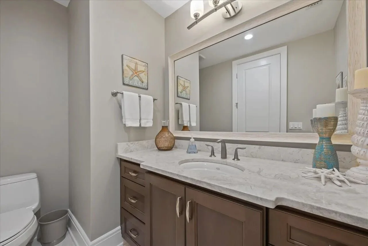 Bathroom countertops do not always need to stop at a straight cabinet line.

By recessing portions of the vanity or extending the top beyond the cabinetry, you can introduce more shape, variation, and custom detail into the design. That extra project