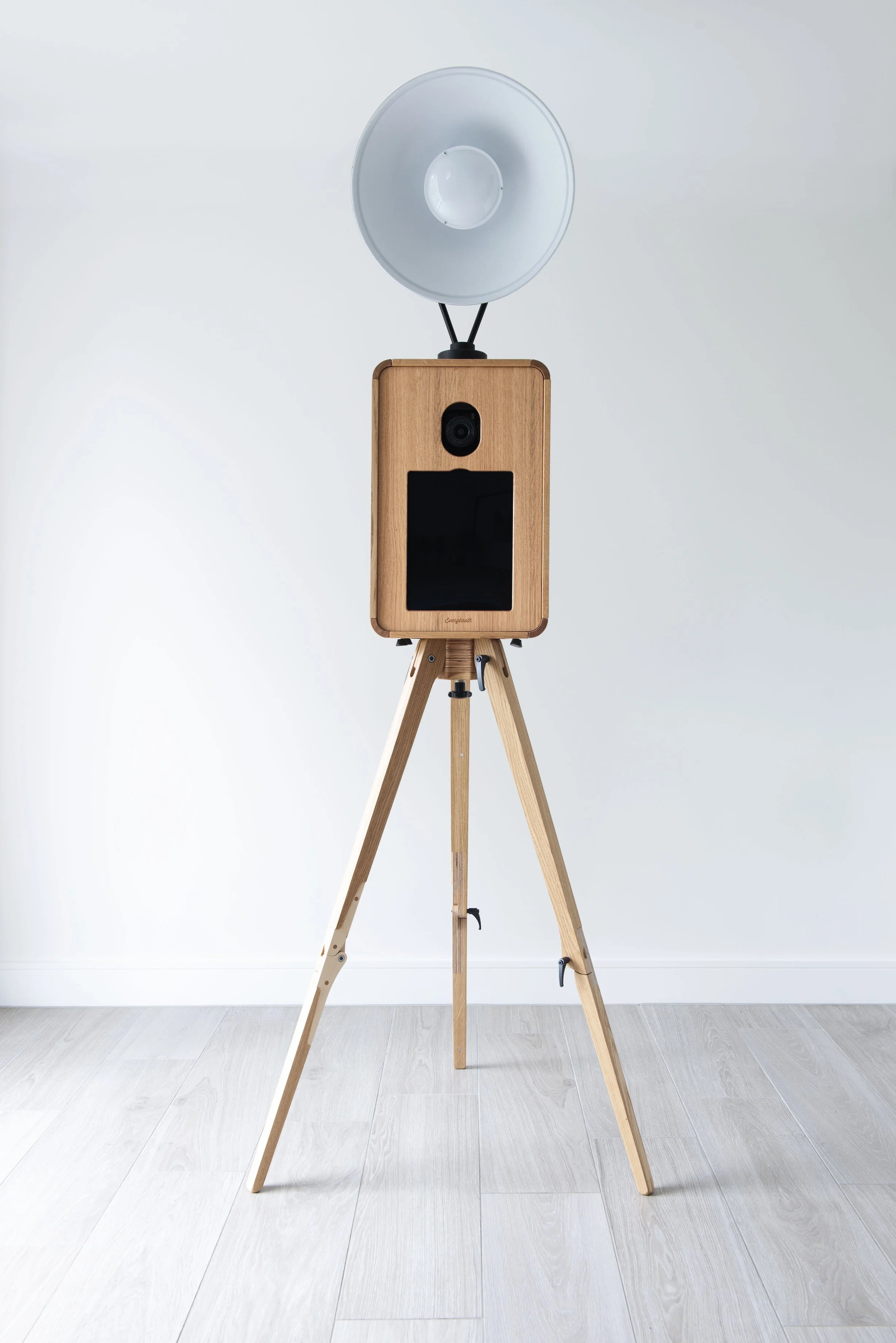 Oak photobooth with flash lighting attached on top