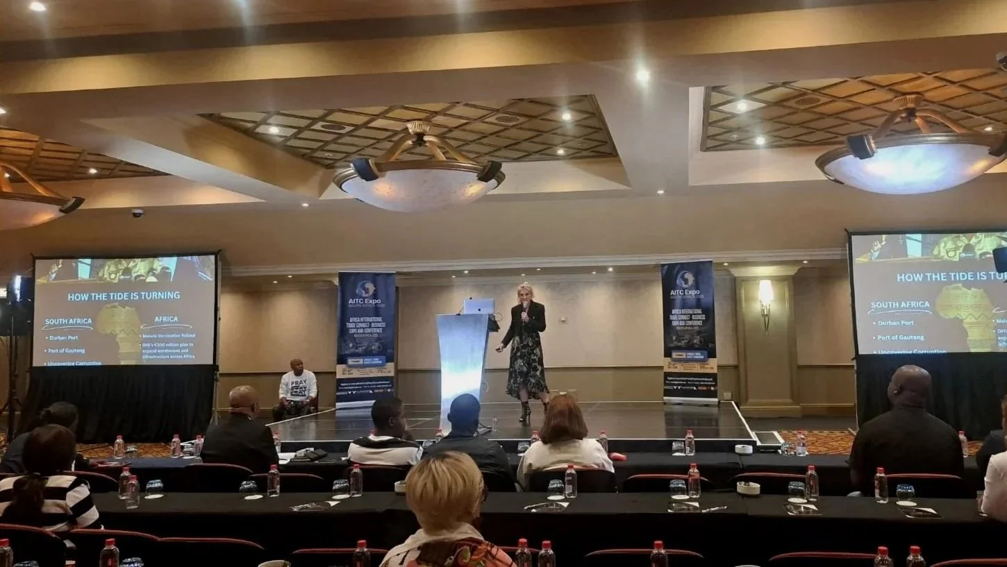 Alison Weihe on stage at the Africa International Trade Connect expo speaking on entrepreneurship