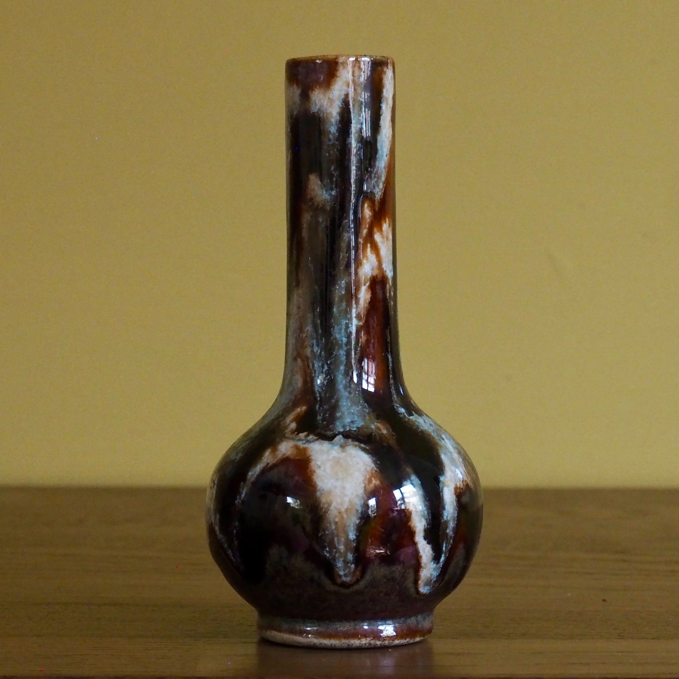 small glazed stem vase