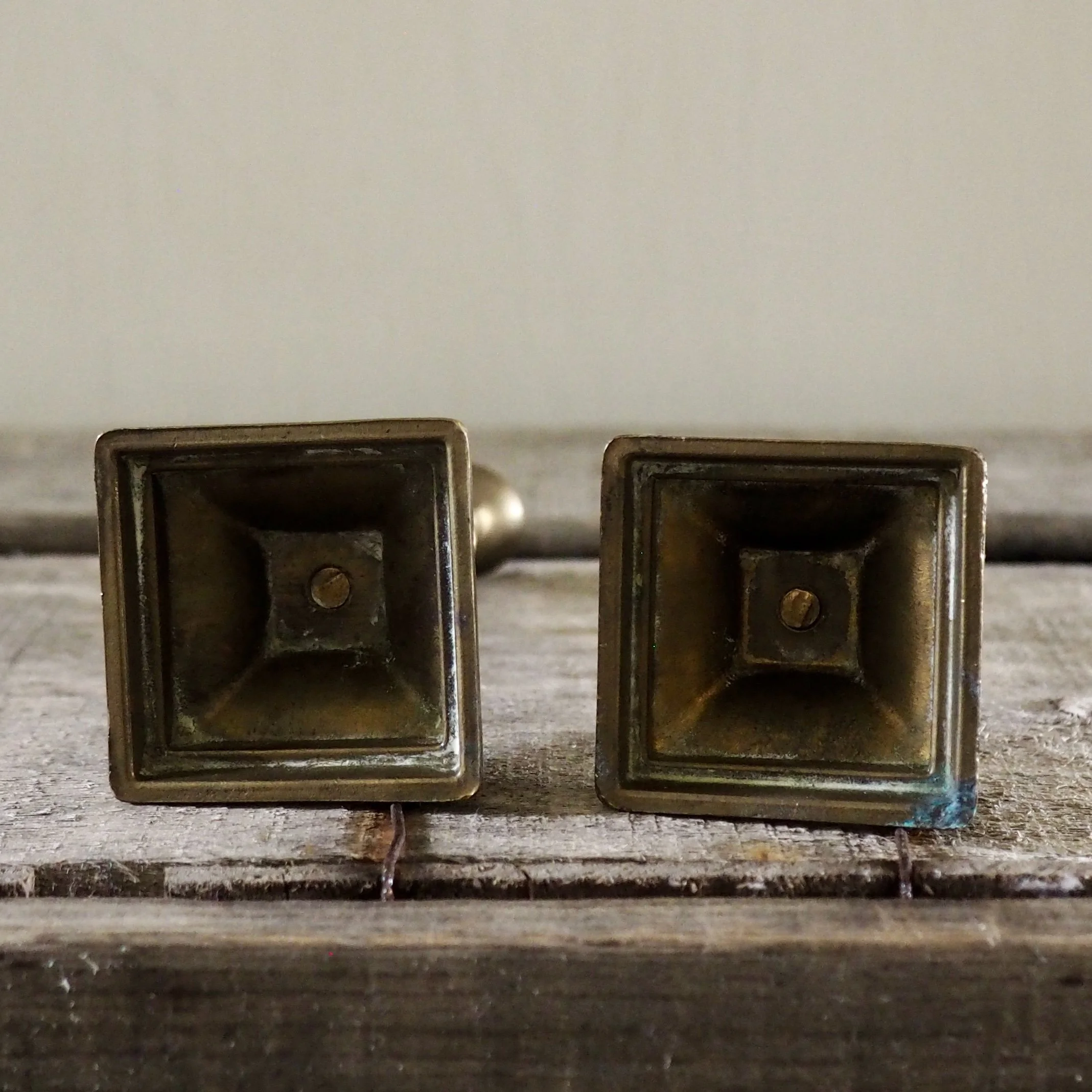 base of small barley twist brass candlesticks