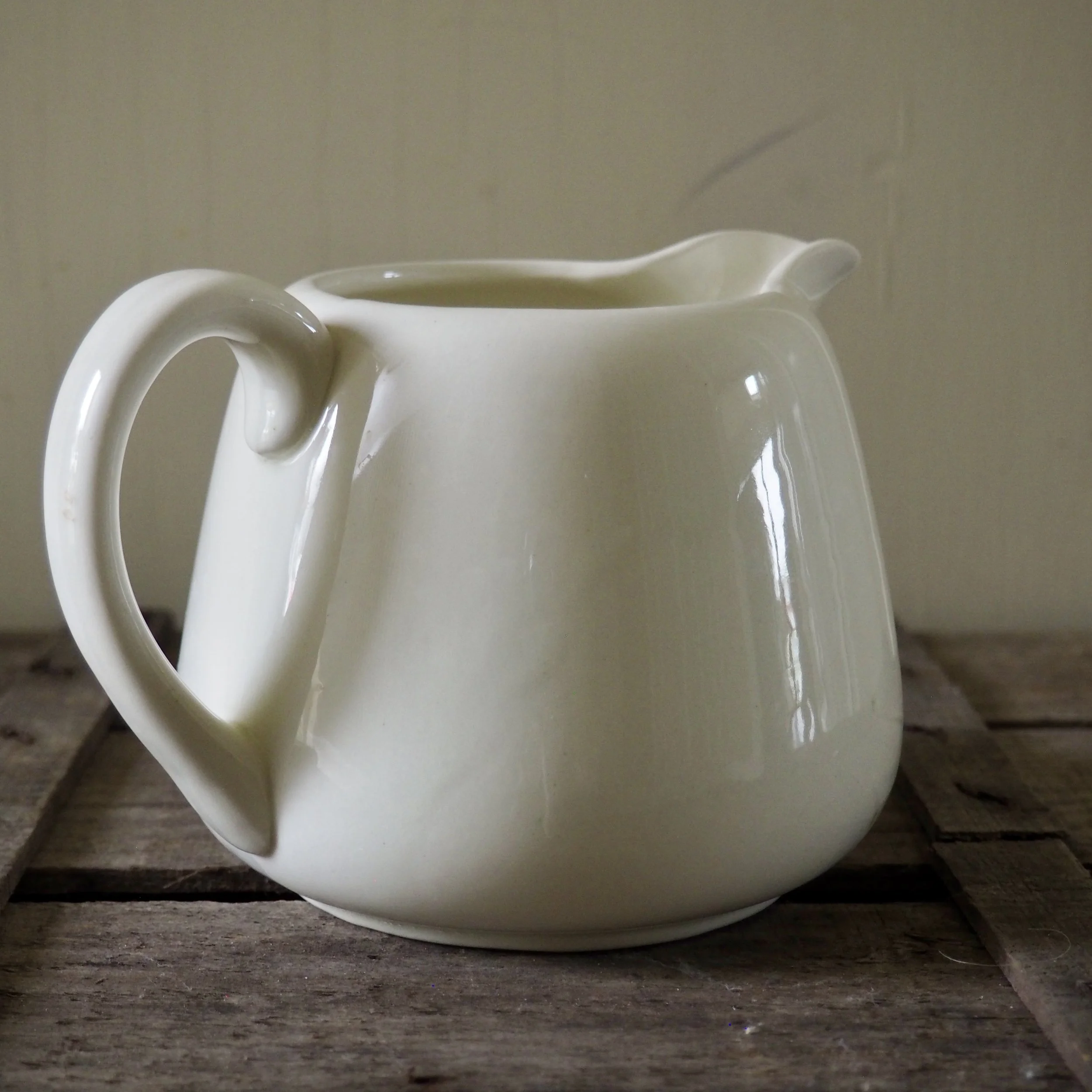 white vintage milk jug