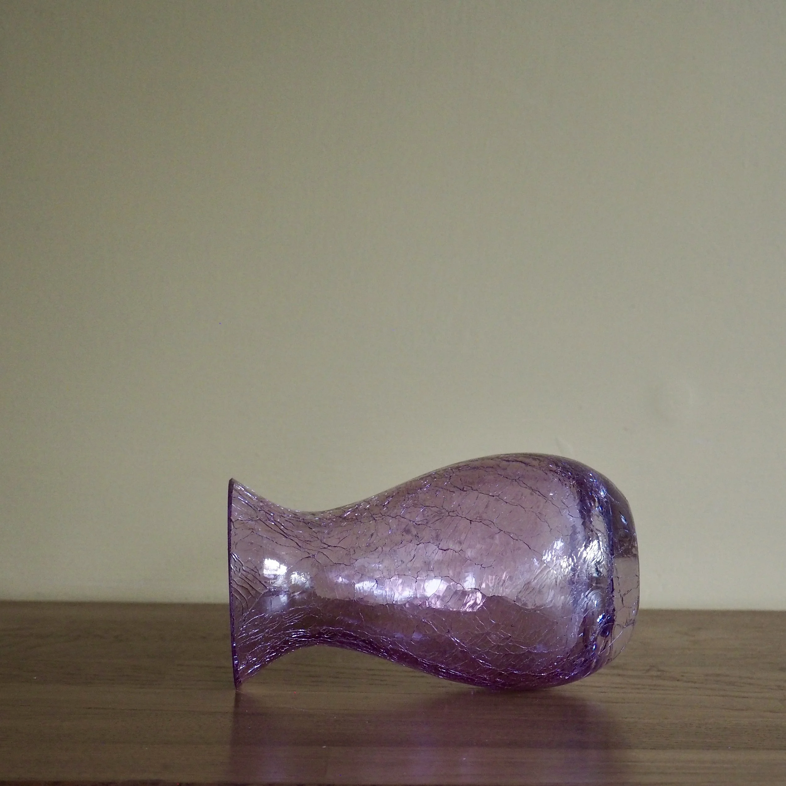Pink vintage crackle glass vase Lying on its side