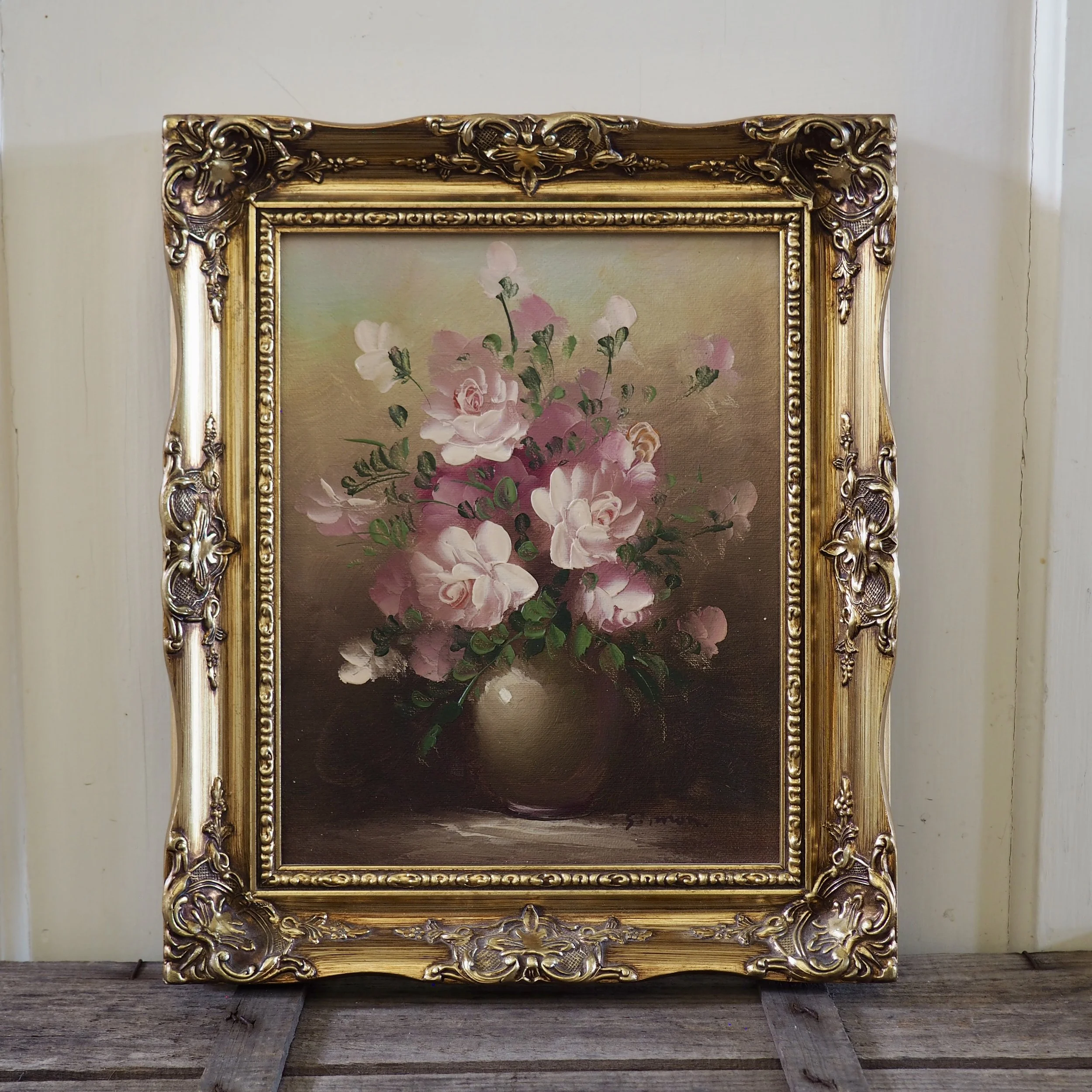small signed oil on canvas still life of roses in a vase