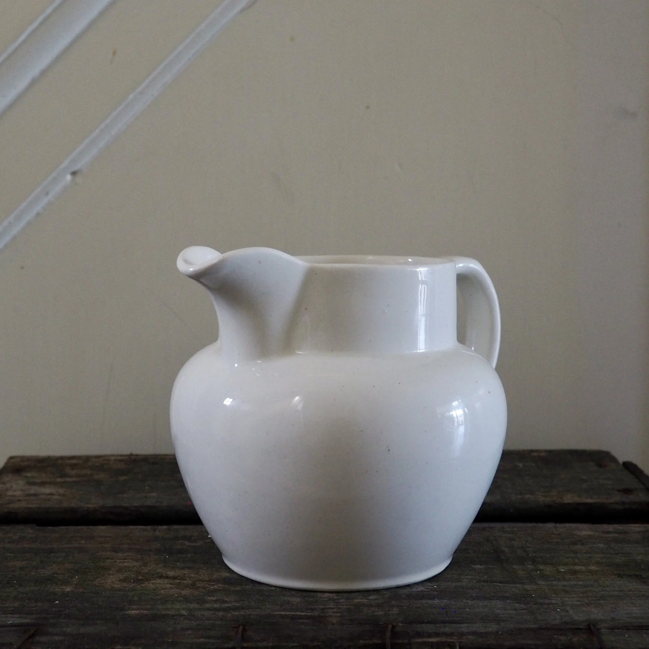 white rustic vintage milk jug
