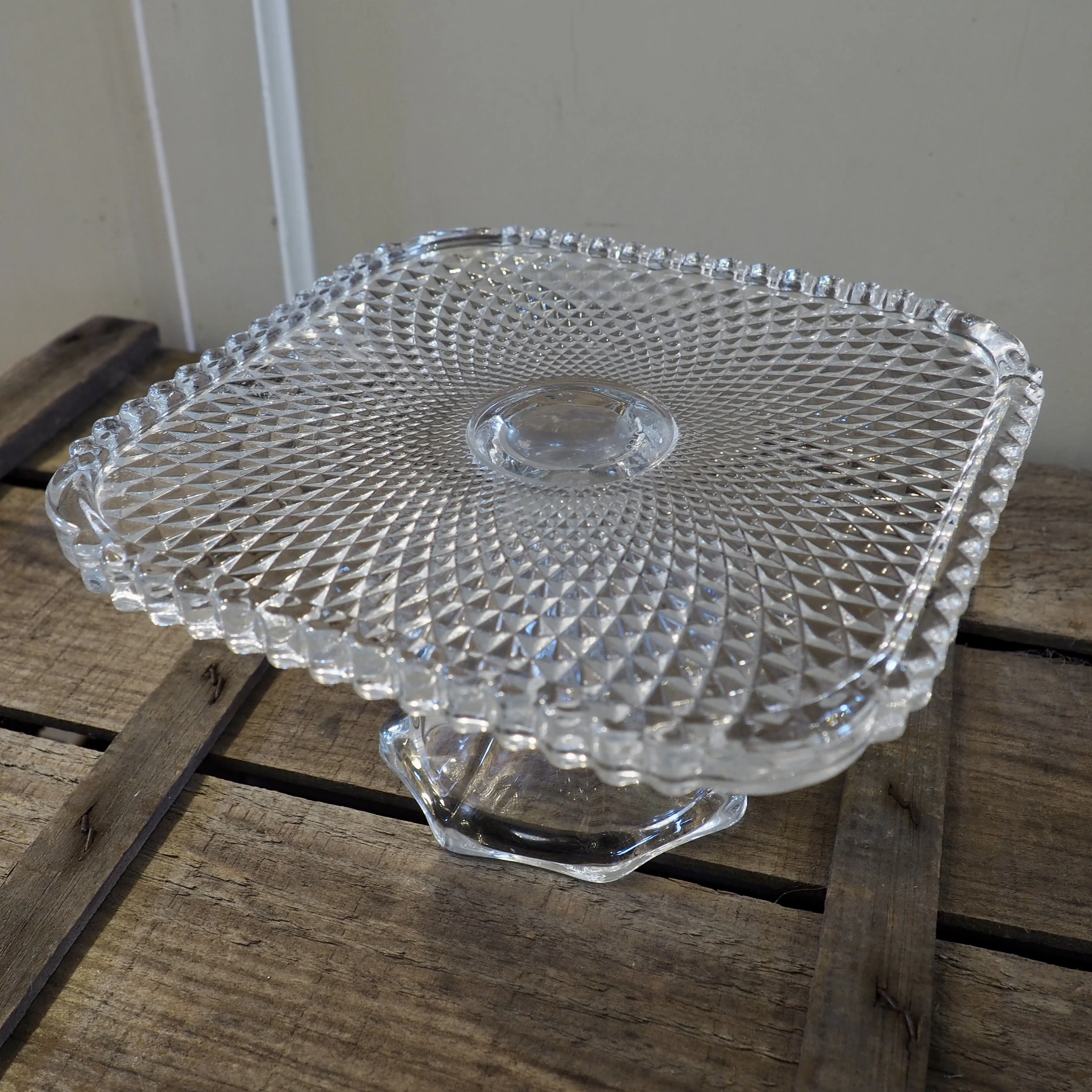 squared footed pressed glass cake stand