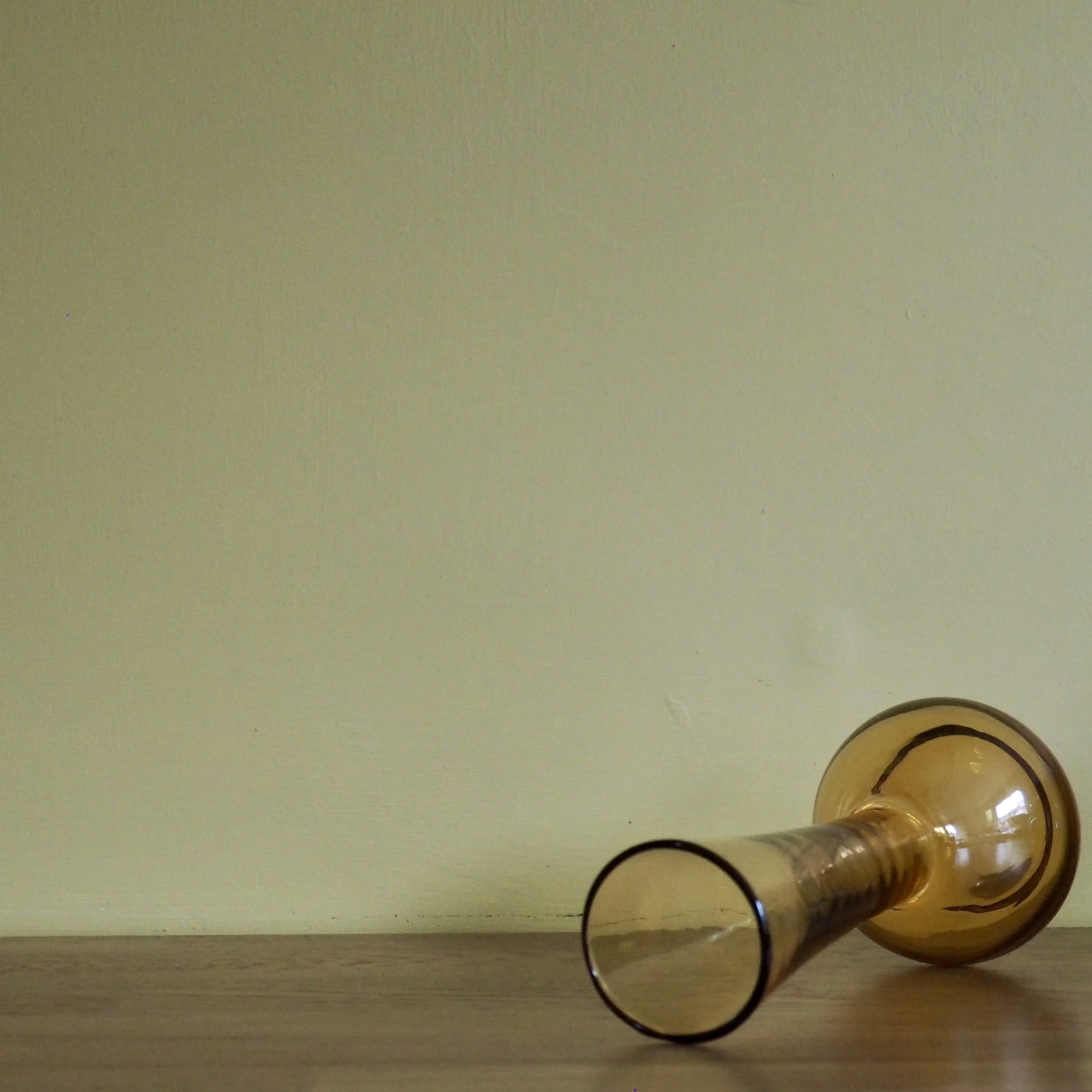 Tall vintage amber hand blown glass stem vase