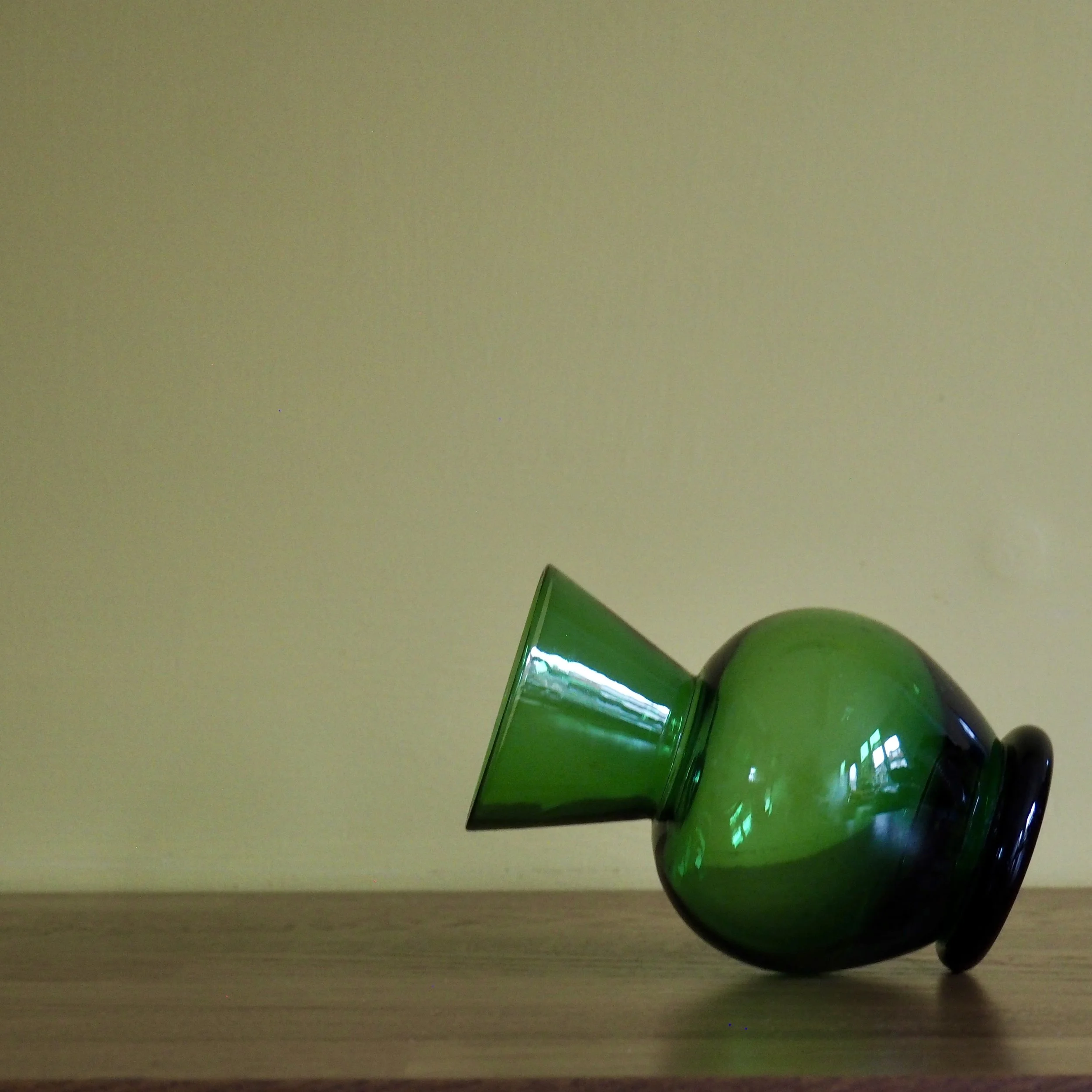 Bottle green miniature vintage art glass vase Side view