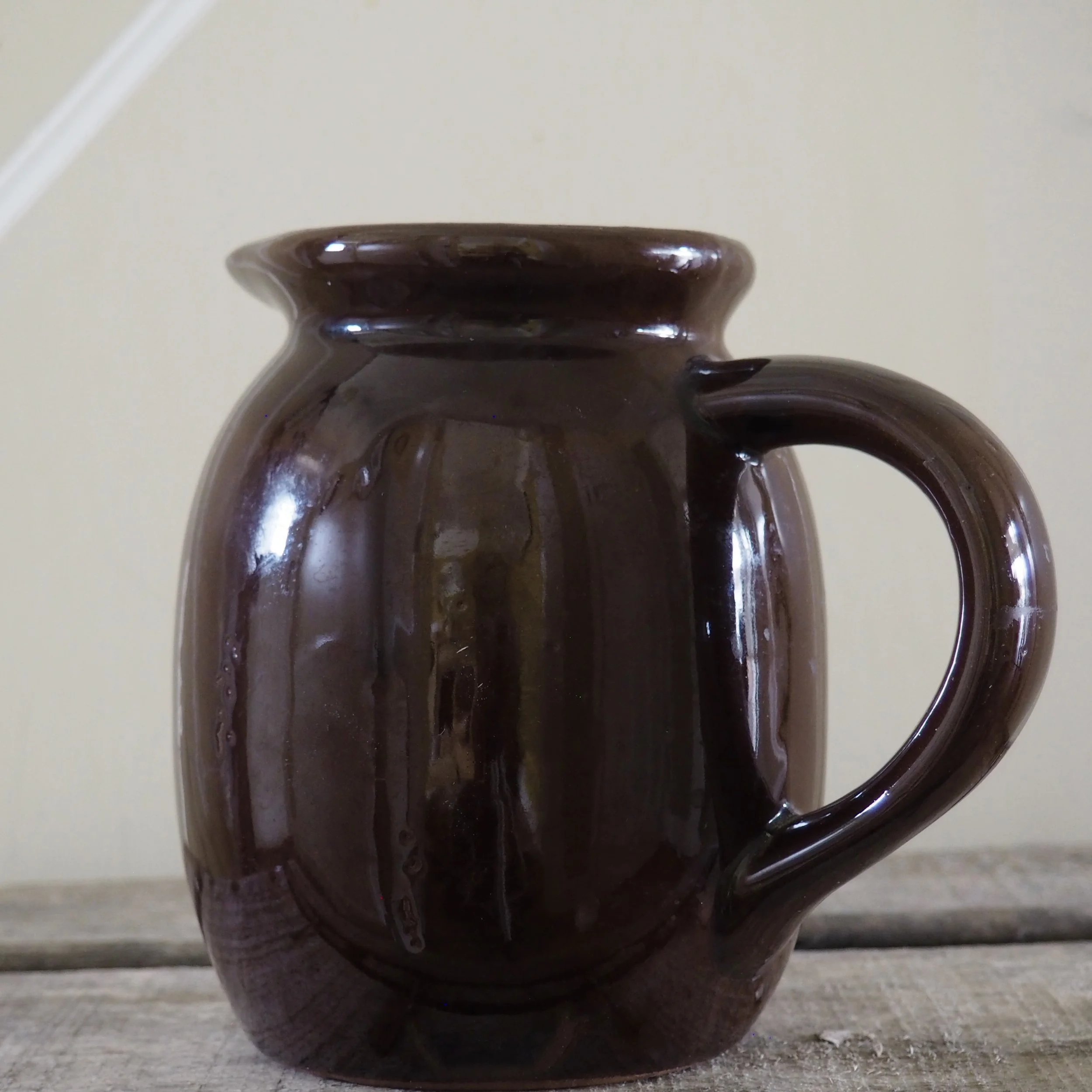 brown stoneware vintage milk jug