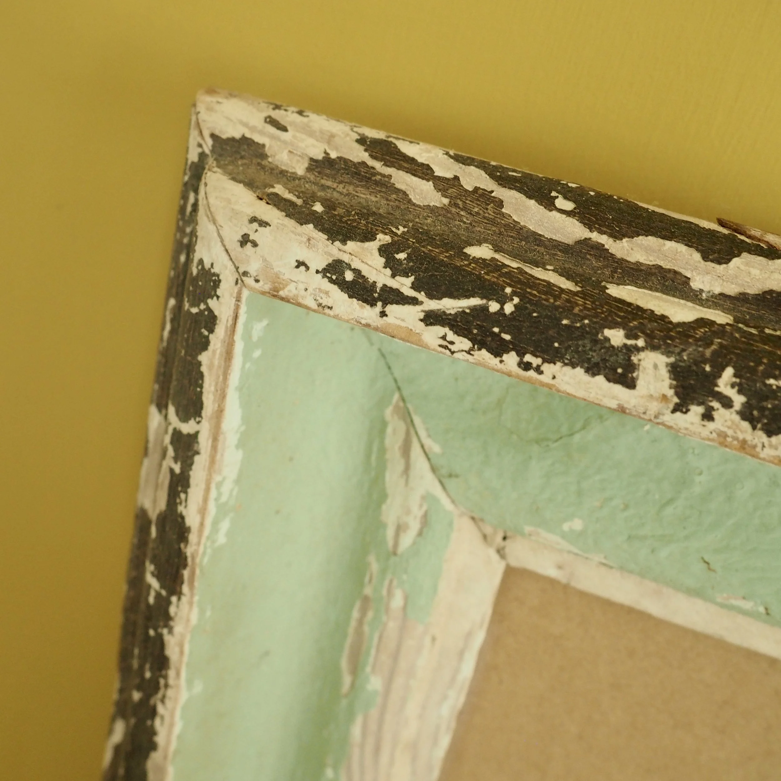 chippy corner of rustic picture frame