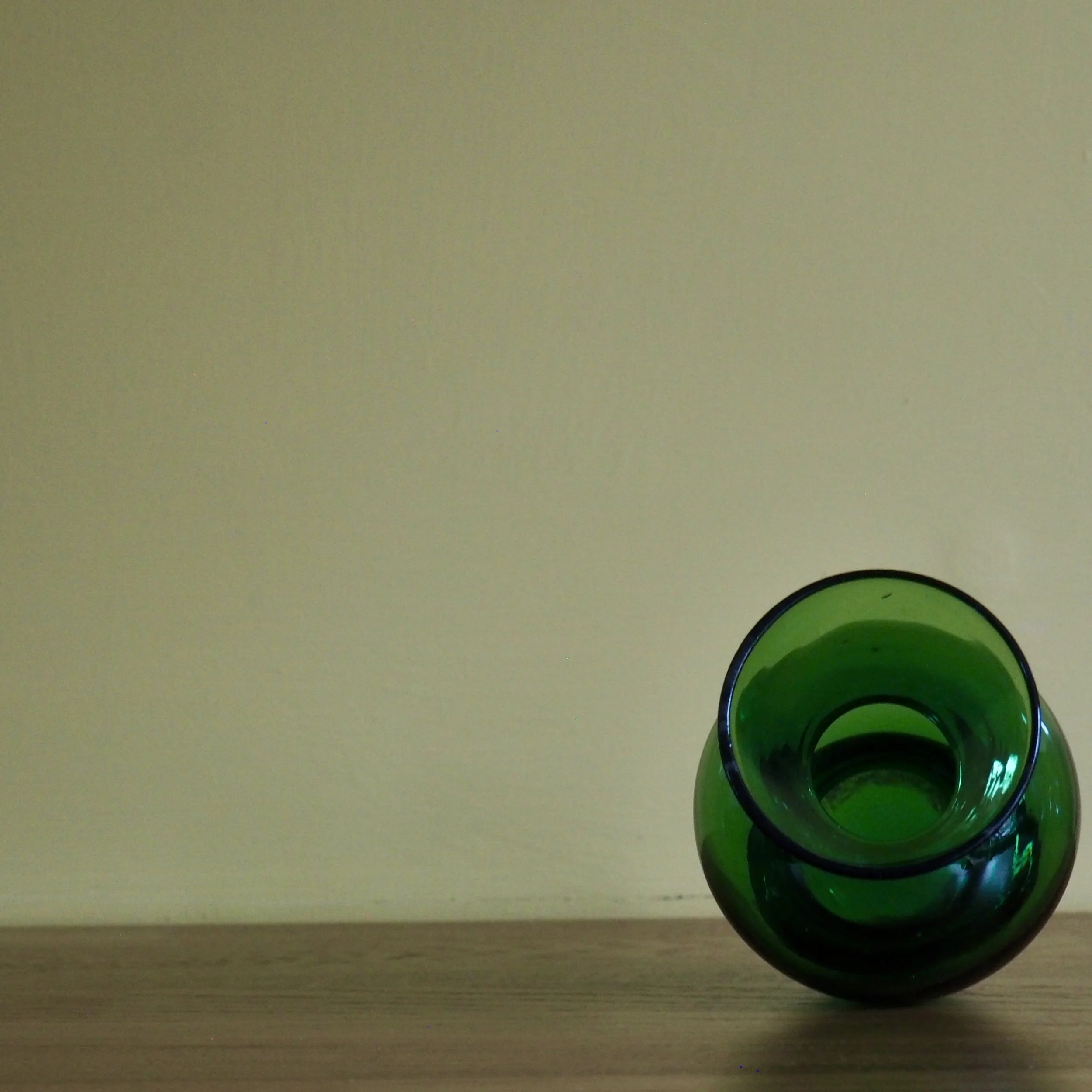 Bottle green miniature vintage art glass vase Top view