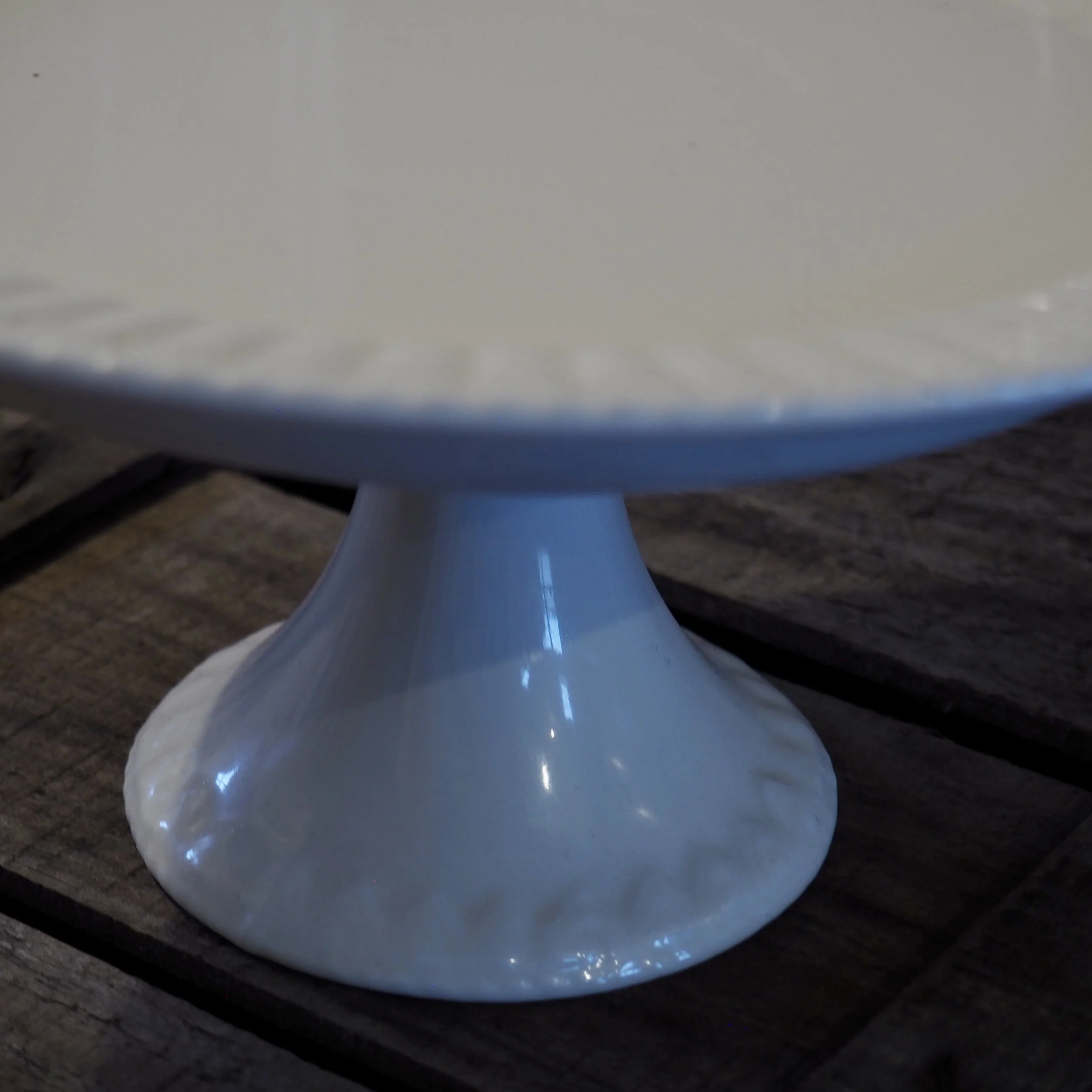white vintage ceramic cake stand