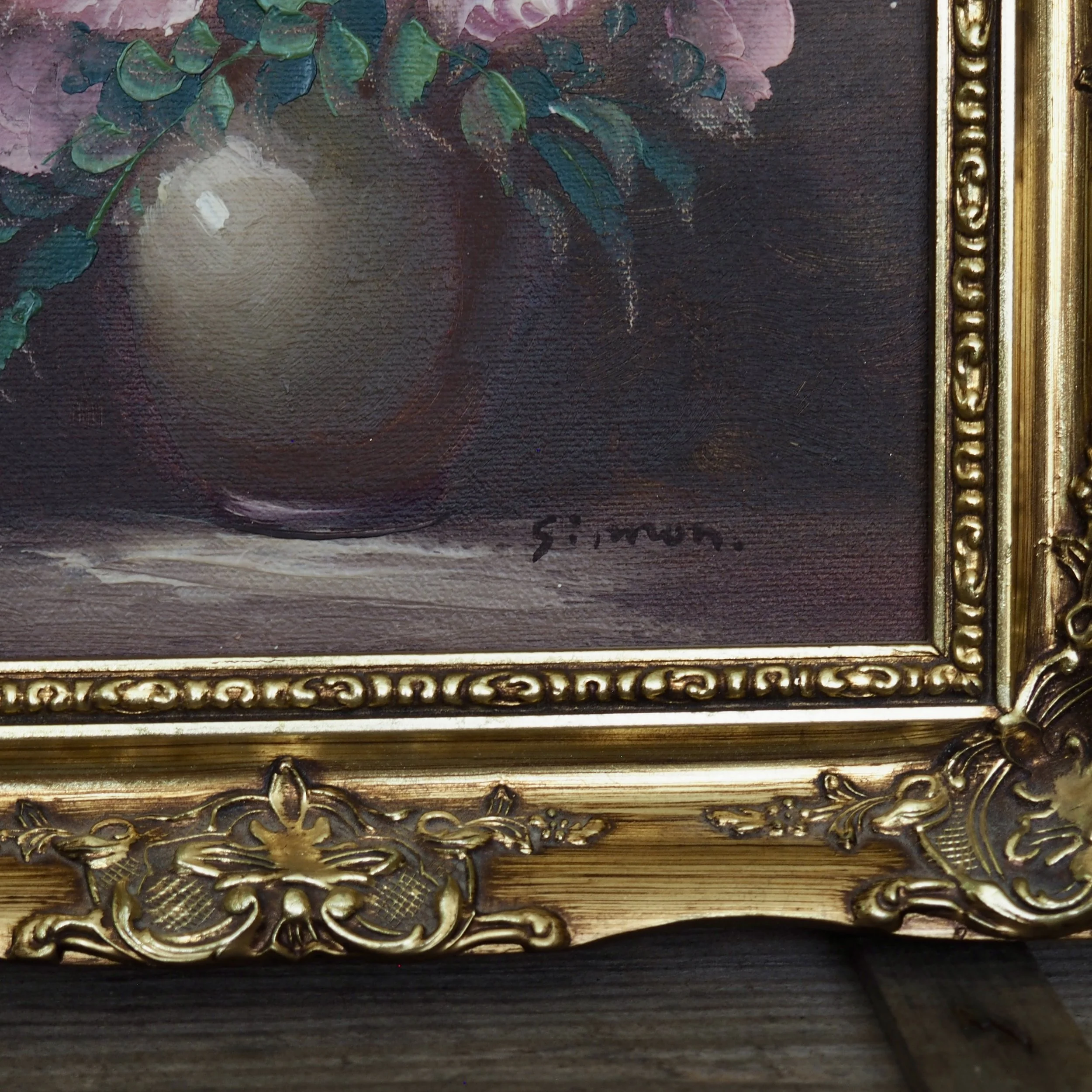 close up of oil painting in a gold gilt frame