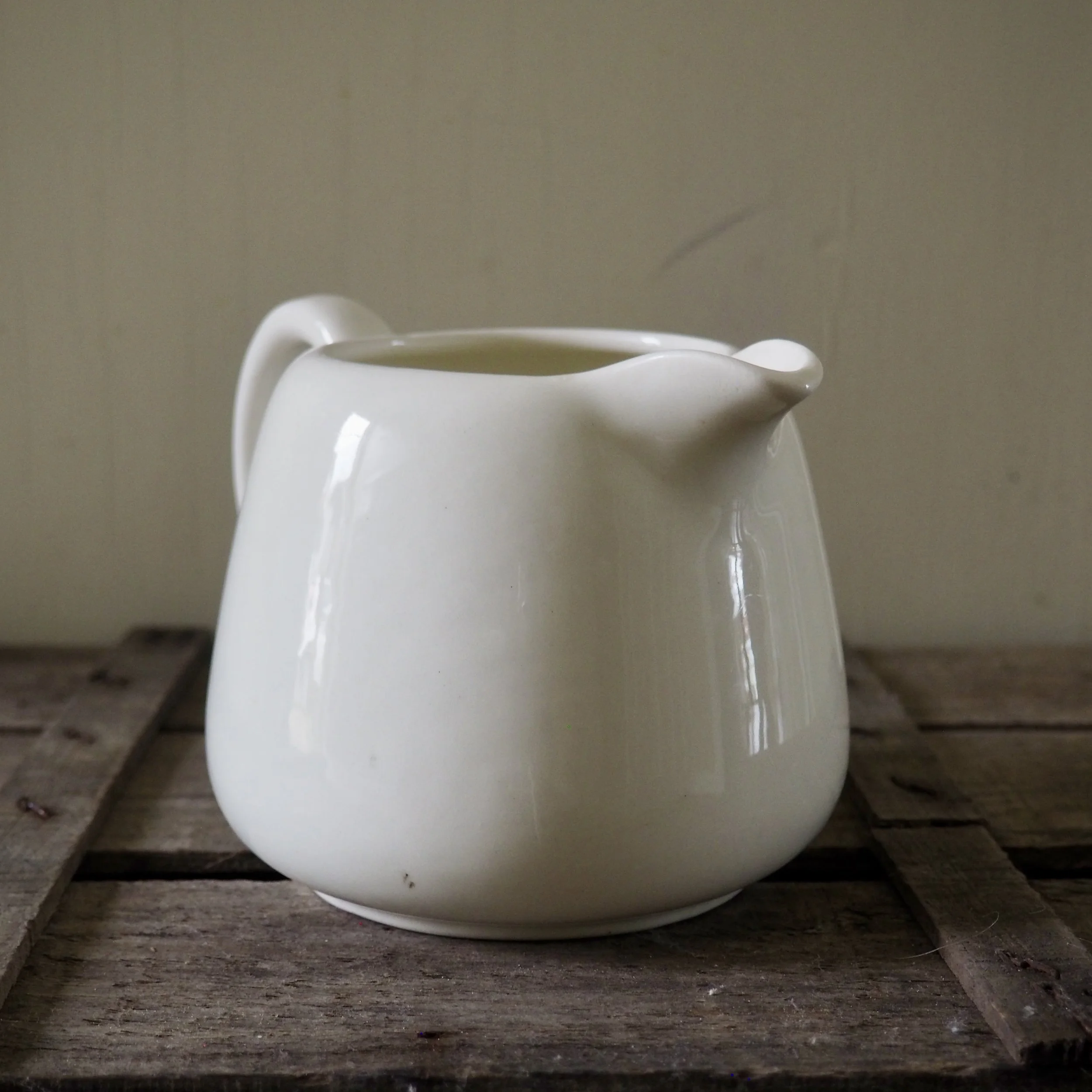 white vintage milk jug