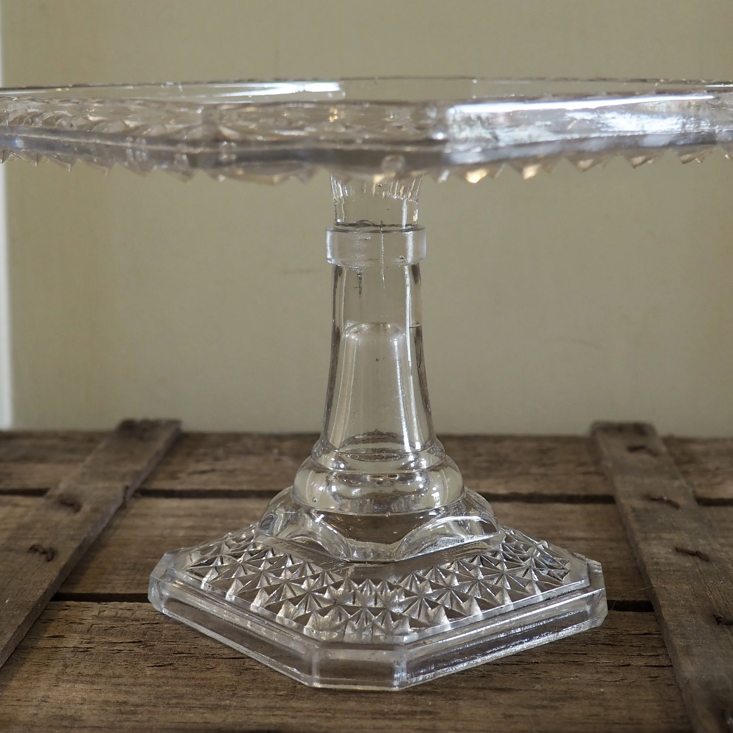 tall heavy pressed glass cake stand