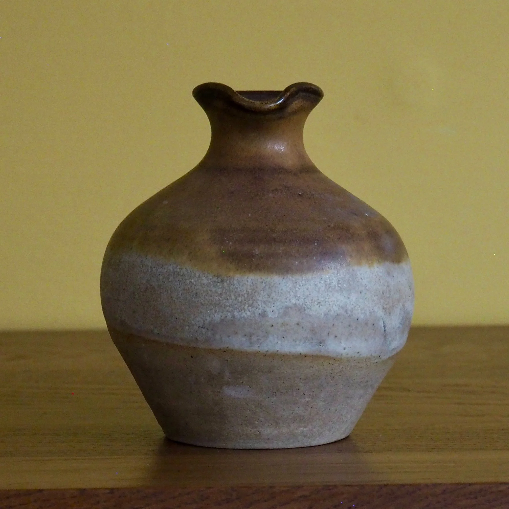small rustic urn style vase