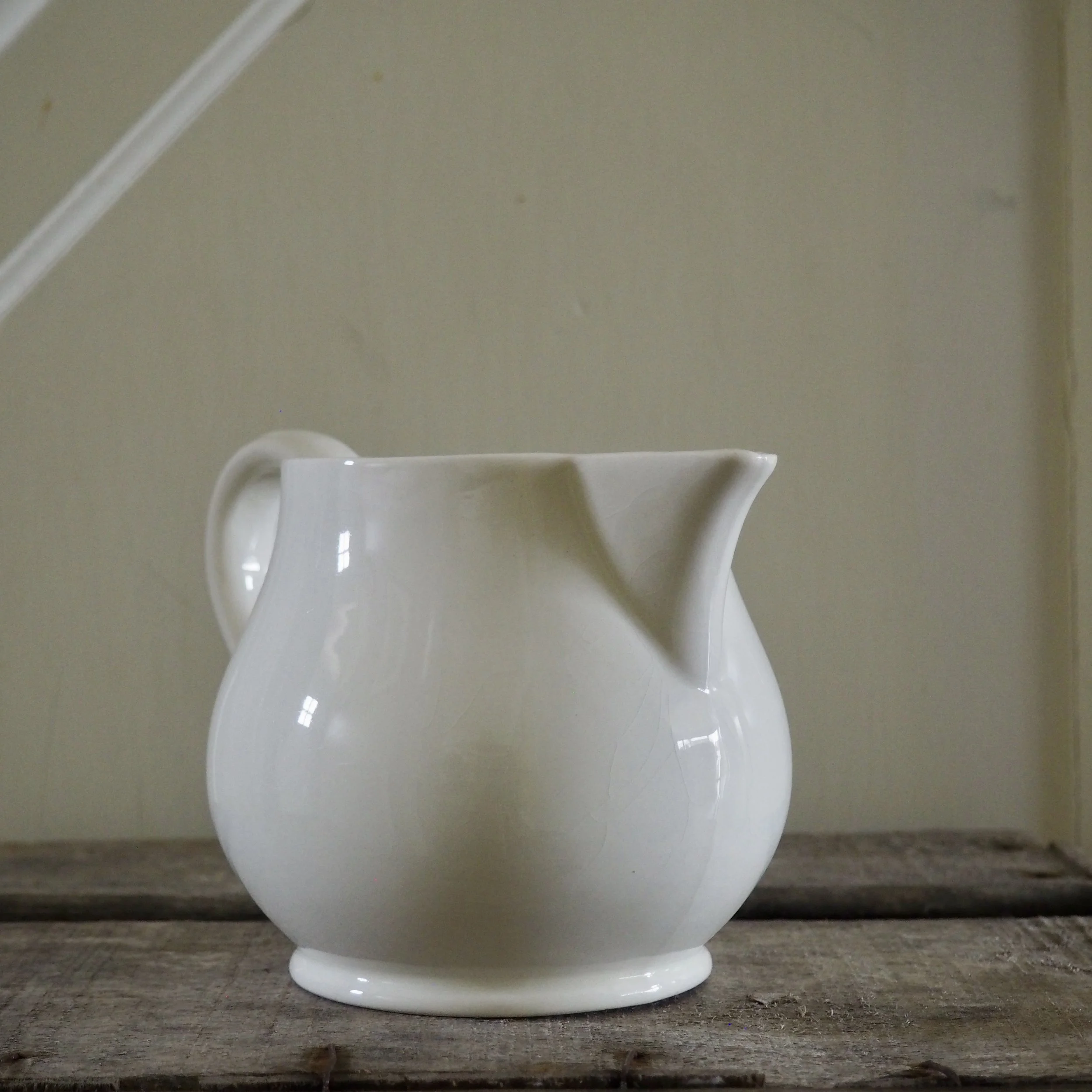 white vintage milk jug