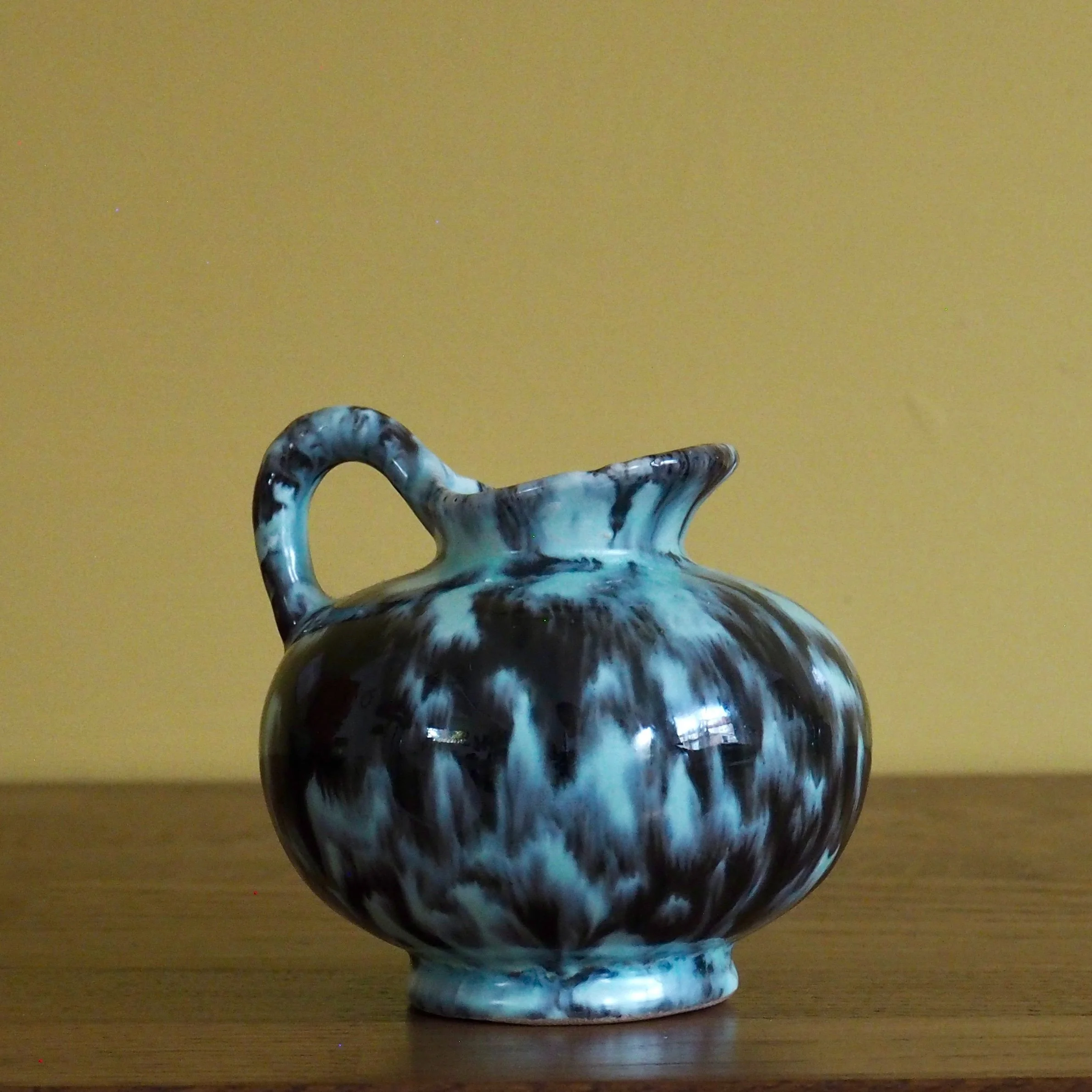 small glazed jug