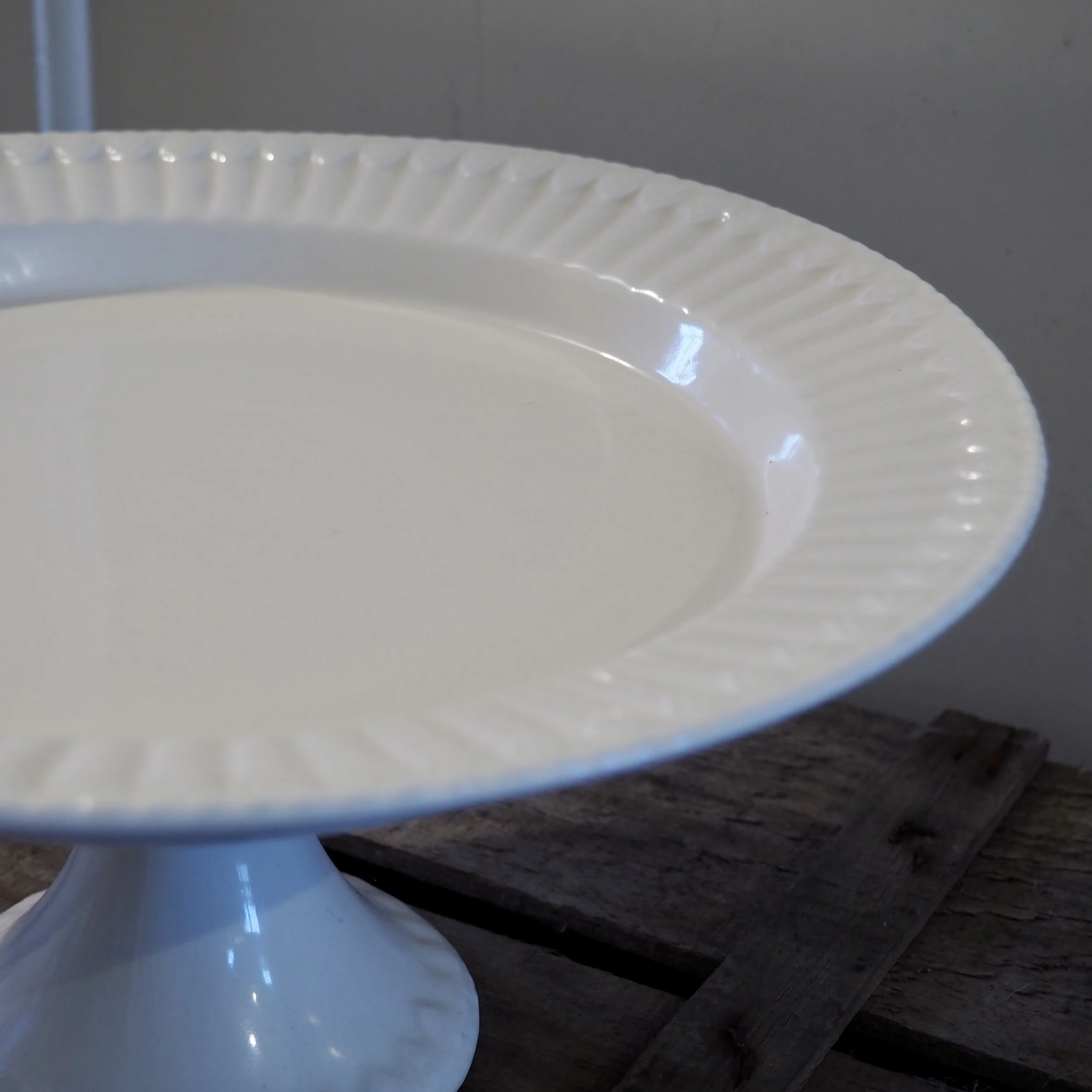 close up of white vintage cake stand