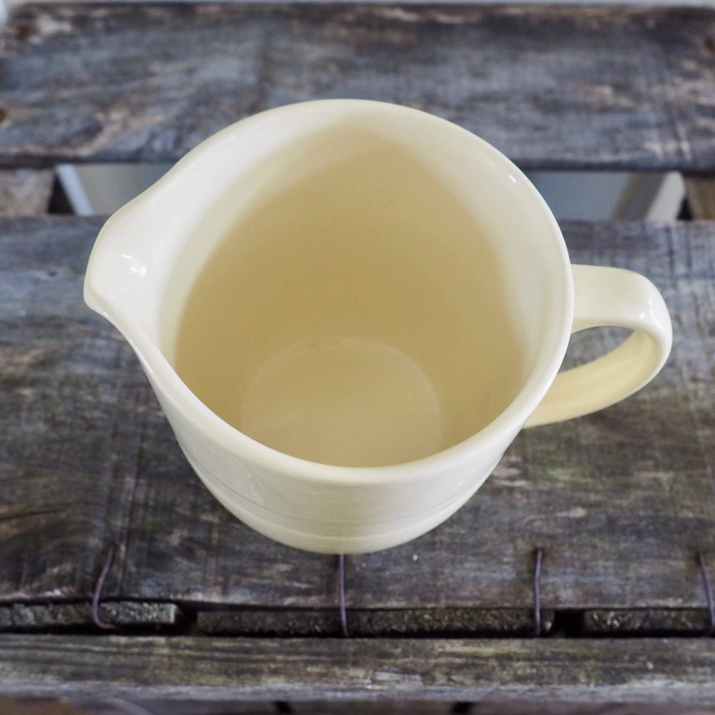 top view of yellow vintage Woods ware jug