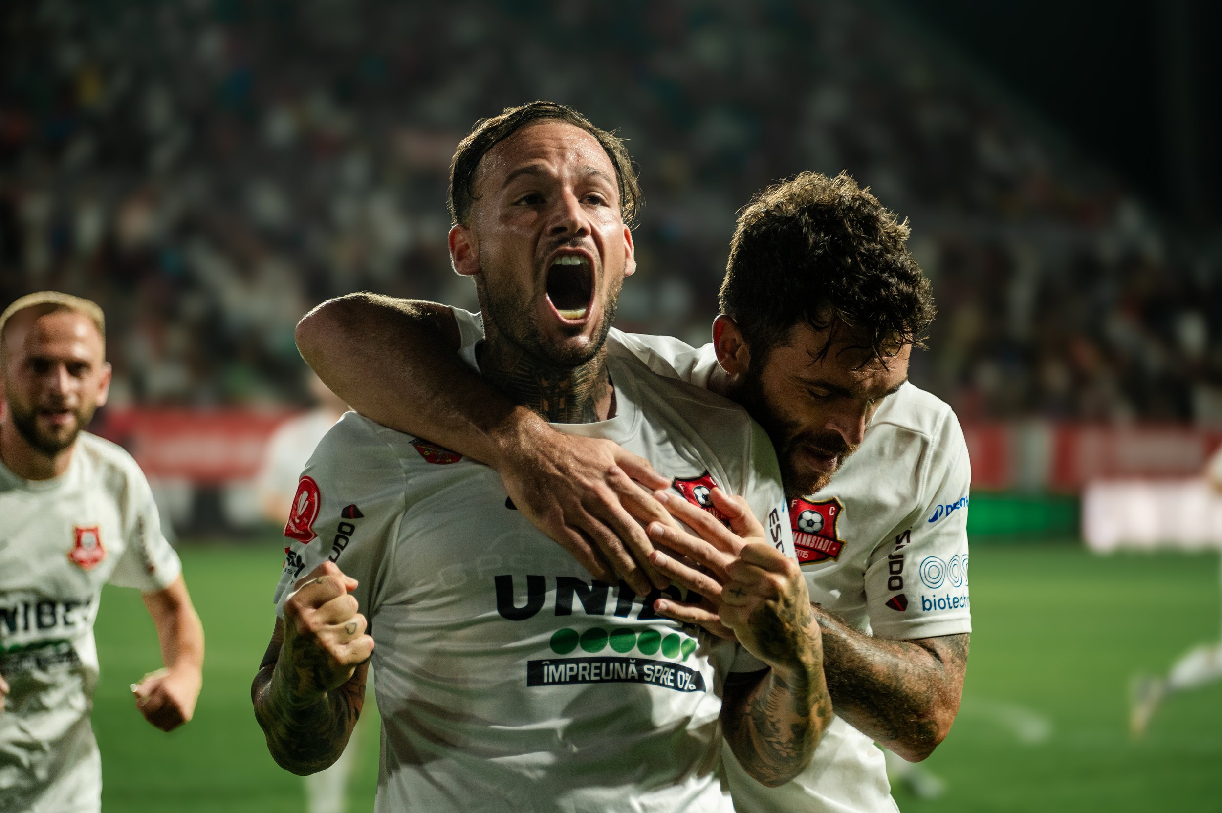 Soccer players celebrating on the field